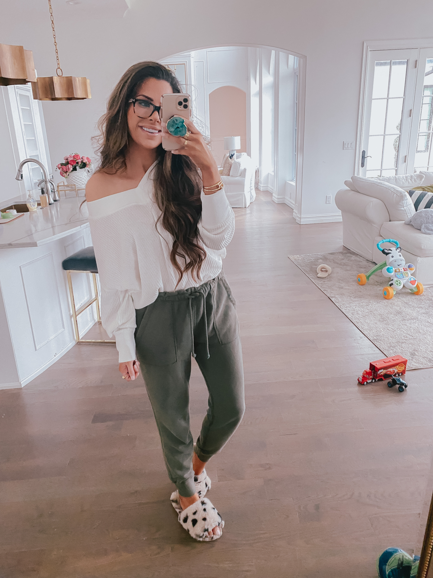 cute loungewear outfits spring 2020, quarantine outfiits, emily gemma | Comfortable Loungewear by popular US fashion blog, The Sweetest Thing: image of Emily Gemma wearing a Z Supply The Desert White Emilia Waffle Thermal Top and Abercrombie and Fitch Logo Joggers.