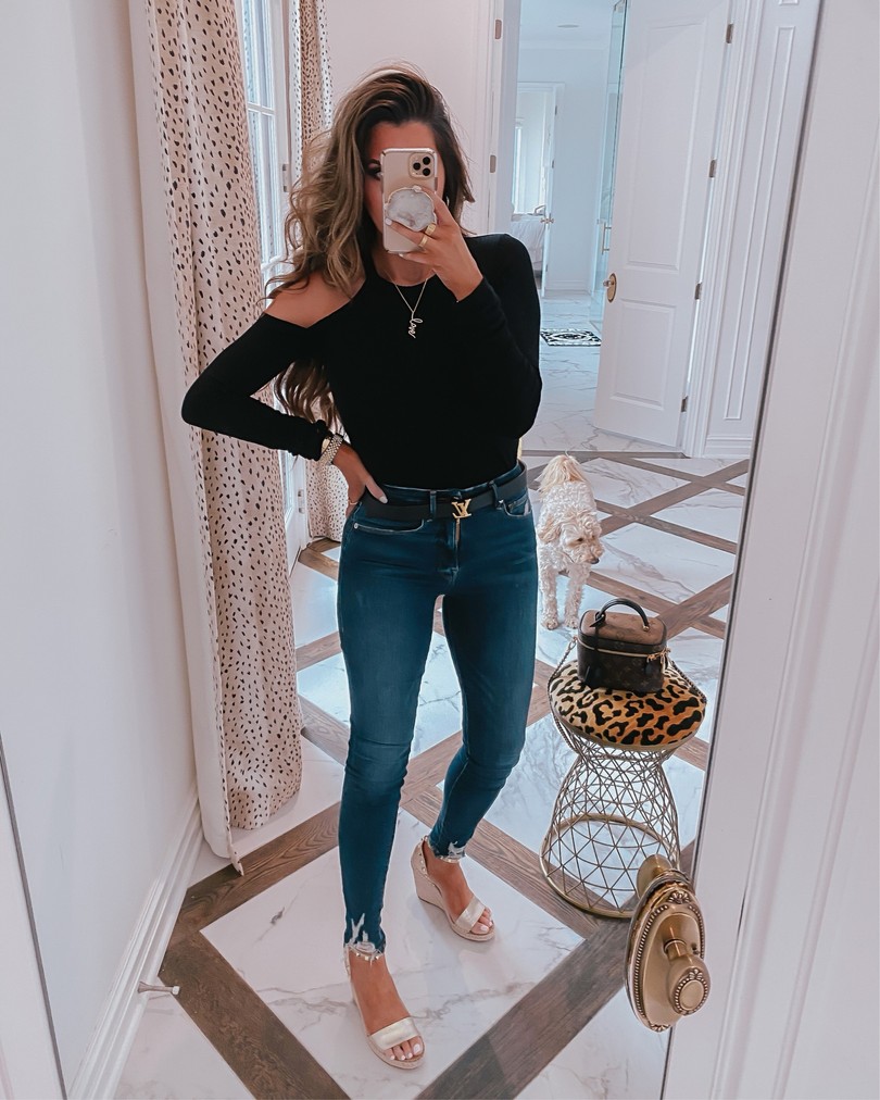 Instagram Recap by popular US life and style blog, The Sweetest Thing: image of Emily Gemma wearing a Nordstrom black Michael Lauren top, Nordstrom Good Waist Distressed High Waist Ankle Skinny Jeans GOOD AMERICAN, Steve Madden MCKENNA GOLD LEATHER, The Styled Collection LOVE SCRIPT PENDANT, The Styled Collection MONROE HOOPS, and holding a smartphone in a clear phone case. 