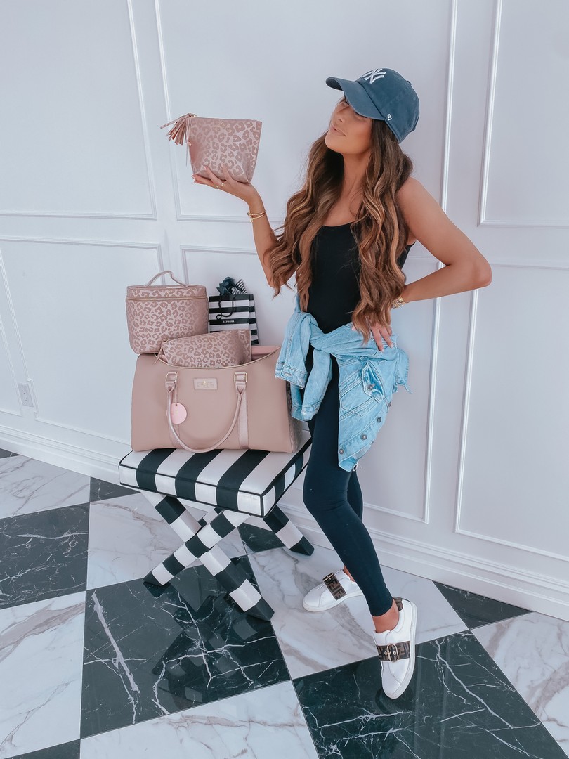Instagram Recap by popular US life and style blog, The Sweetest Thing: image of Emily Gemma wearing Zella leggins, Vince black top, denim jacket, Urban Outfitters New York Yankies hat, Frendi sneakers, and holding a leopard print Hollis bag.  