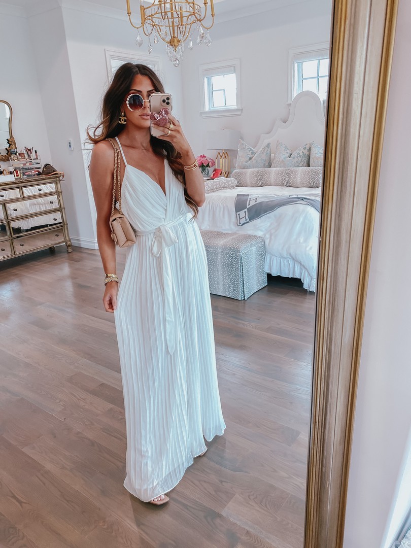 Instagram Recap by popular US life and style blog, The Sweetest Thing: image of Emily Gemma wearing a white jumpsuit, Steve Madden Heels, Pearl Embellished sunglasses, and holding a Channel purse. 