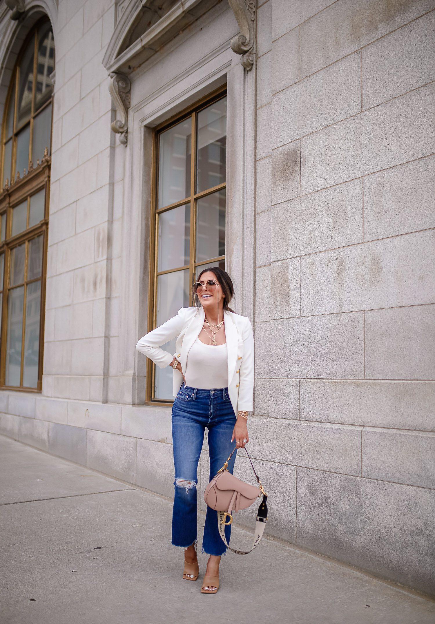 express spring fashion 2020, dior saddle bag, bottega stretch nude sandal, white blazer gold buttons balmain dupe, tulsa fashion blogger, emily gemma | Business Casual Outfit by popular US fashion blog, The Sweetest Thing: image of Emily Gemma wearing a Express Double Breasted 3/4 Sleeve Novelty Button Blazer, Express Scoop Neck Sweater Cami, and Express Sunglass Chain.