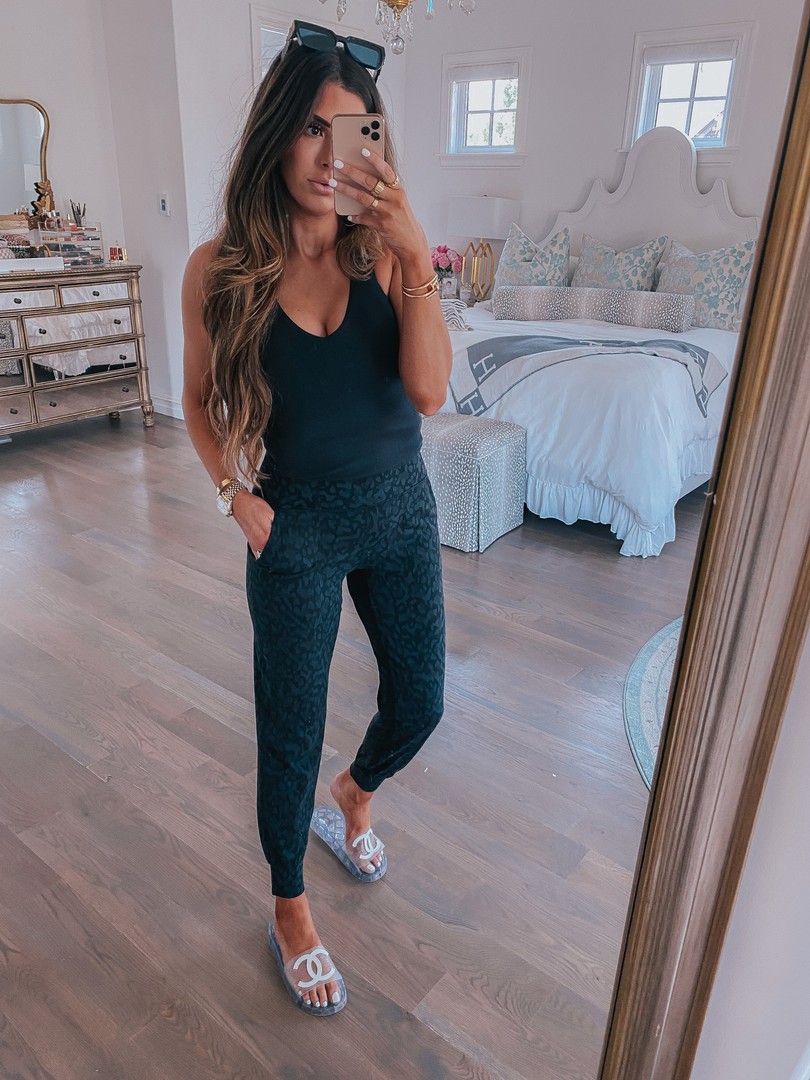 Instagram Recap by popular US life and style blog, The Sweetest Thing: image of Emily Gemma wearing a Alo top, Lululemon joggers, and Chanel slide sandals. 