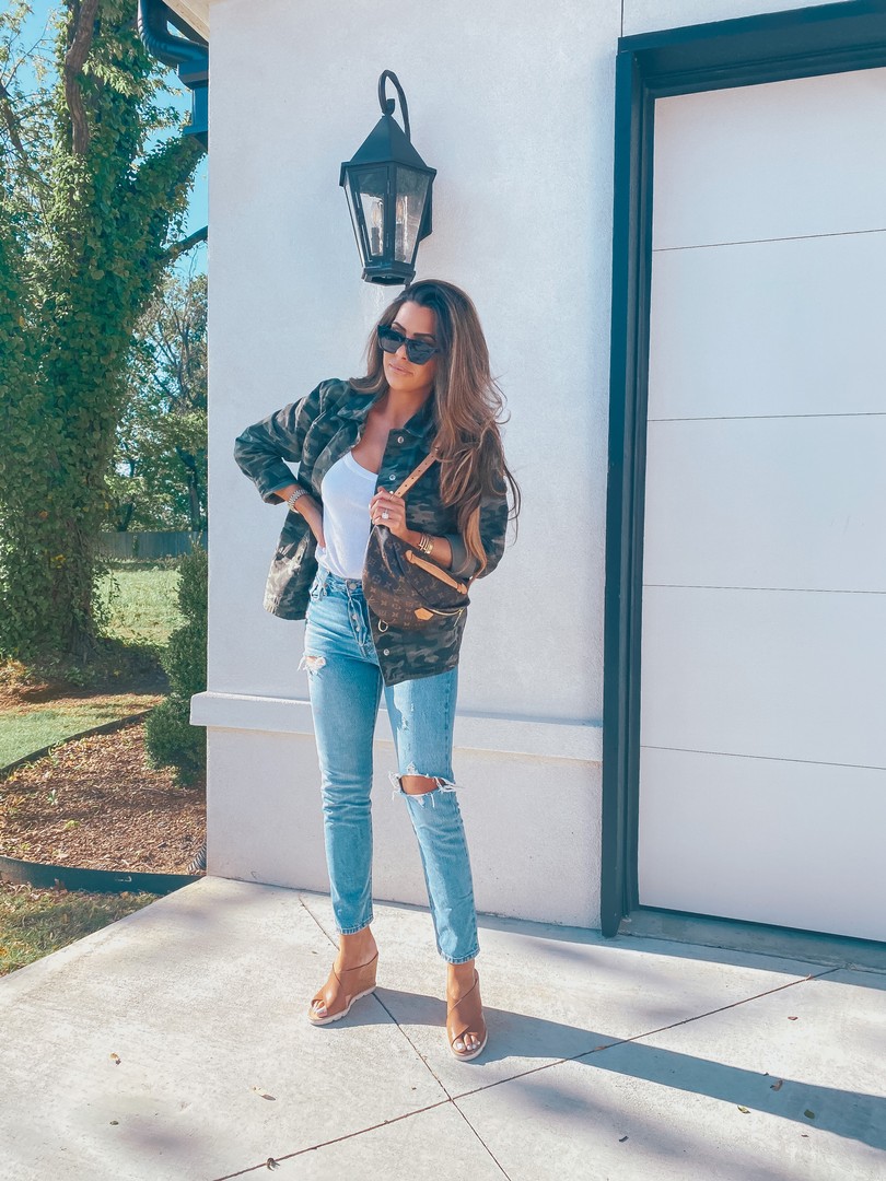 Instagram Recap by popular US life and style blog, The Sweetest Thing: image of Emily Gemma wearing a Express Scoop Neck Sweater Cami, Nordstrom 54mm Small Rectangular Sunglasses BP., Steve Madden FLORETTA COGNAC LEATHER, Good American camo jacket, and holding a Louis Vuitton bum bag. 