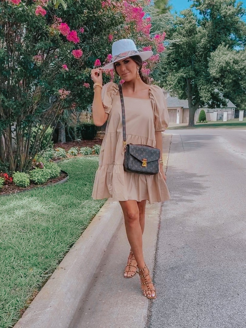 Instagram Recap by popular US life an style blog, The Sweetest Thing: image of Emily Gemma standing outside and wearing a H&M dress, Valentino shoes, Chanel earrings, Cartier bracelets, Alessandra Bailey hat, Rolex watch and carrying a Louis Vuitton bag. 