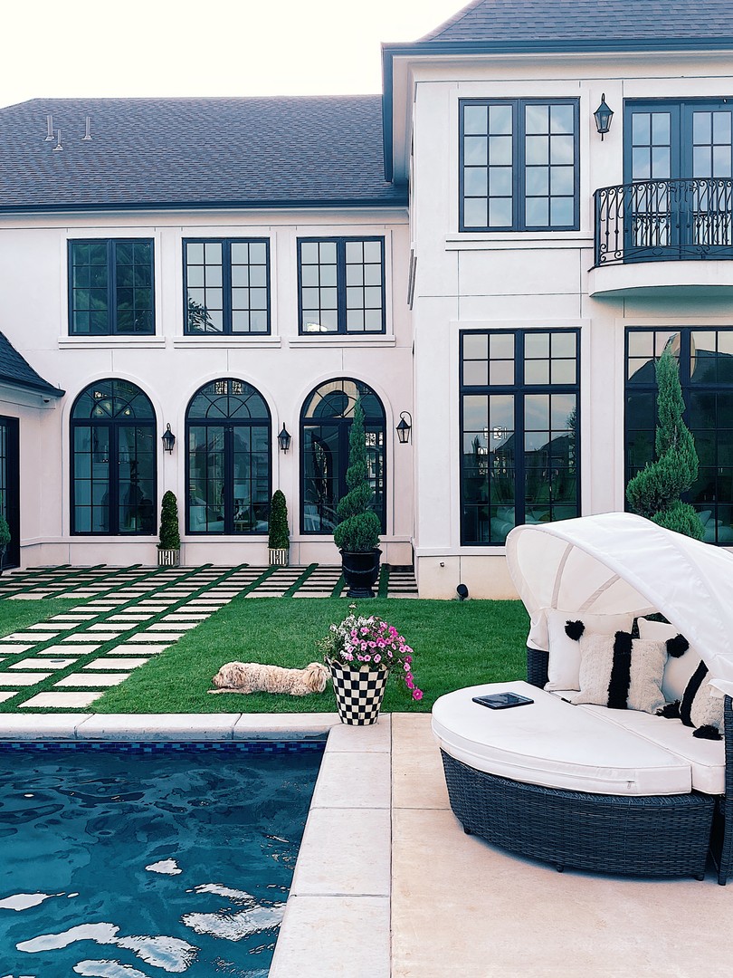  Instagram Recap by popular US life an style blog, The Sweetest Thing: image of a backyard with a pool, and Sol 72 Outdoor daybed. 