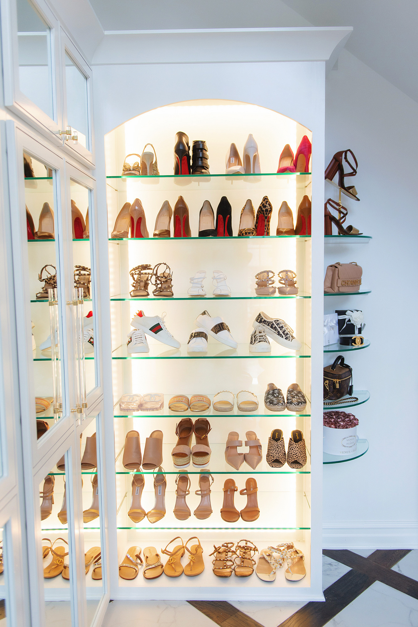 Blog Design by popular US lifestyle blog, The Sweetest Thing: image of a shoe display filled with Christian Louboutain heels, Steve Madden heels, and other designer shoes. 