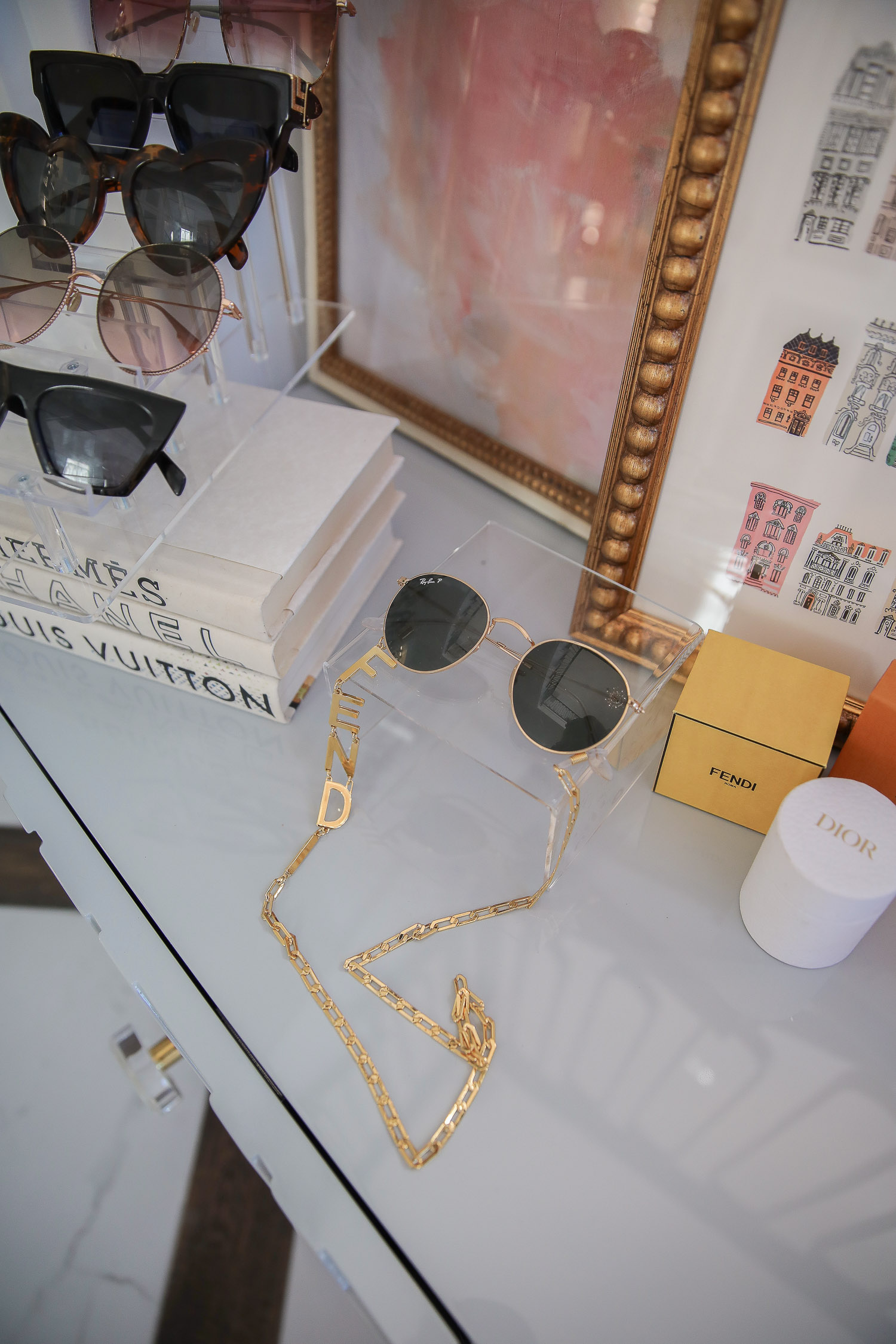 amazon must haves summer 2020, amazon home decor blog post, amazon luxury must haves, two story closet pinterest, emily gemma, closet organization | Instagram Recap by popular US life an style blog, The Sweetest Thing: image of a Fendi sunglasses chain, Acrylic sunglasses stand, Nordstrom stacked books, Amazon sunglasses, Gucci, Sunglasses, Dior Sunglasses, YSL sunglasses, Louis Vuitton sunglasses, Dior candle, and Parisian building art. 