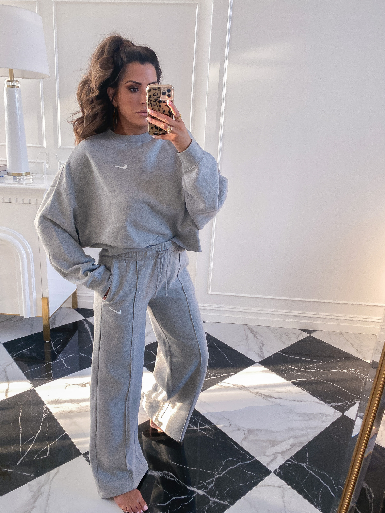 Nordstrom Anniversary Sale 2020 try on guide, NSALE 2020 nike womens, emily gemma | Nordstrom Anniversary Sale by popular US fashion blog, The Sweetest Thing: image of Emily Gemma wearing a NIKE Crewneck Sweatshirt and NIKE Palazzo Pants.