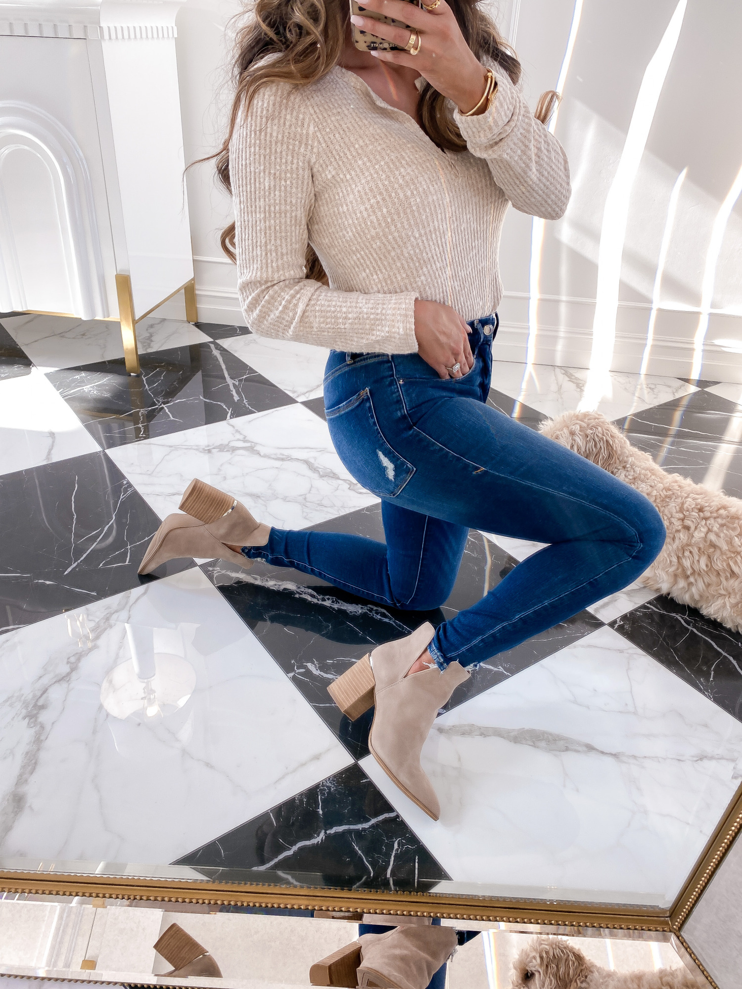 Nsale 2020 blog post must haves picks, nsale 2020 fashion blogger, emily gemma | Nordstrom Anniversary Sale by popular US fashion blog, The Sweetest Thing: image of Emily Gemma wearing a Kaylah Pointed Toe Bootie STEVE MADDEN, Good American Good Legs High Waist Raw Hem Skinny Jeans, and Long Sleeve Thermal Henley Top SOCIALITE.
