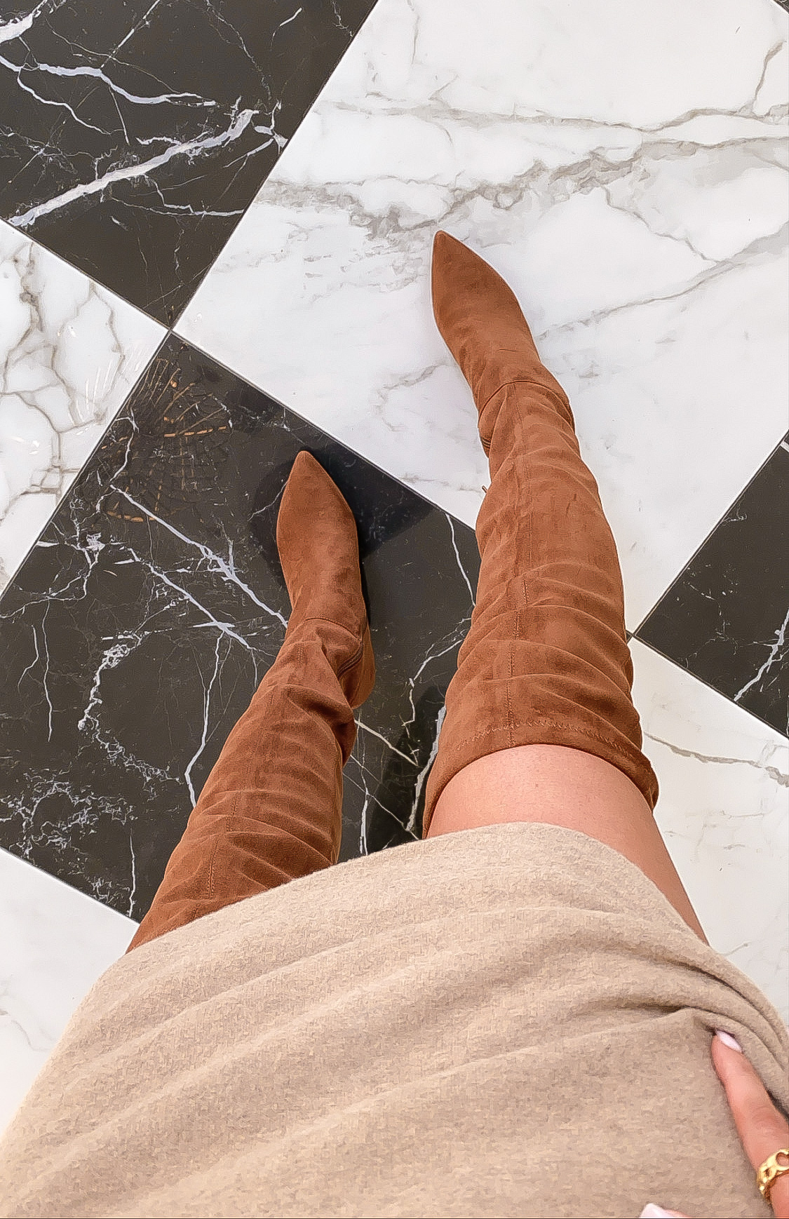 best of NSALE 2020, over the knee boots NSALE 2020 | Nordstrom Anniversary Sale by popular US fashion blog, The Sweetest Thing: image of Emily Gemma wearing a Socialite Double-V Long Sleeve Knit Dress and Steve Madden Nifty Pointed Toe Over the Knee Boot.