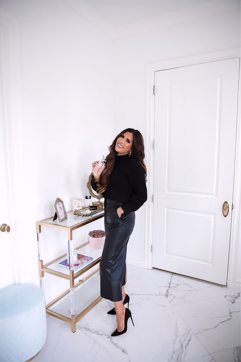Instagram Recap by popular US lifestyle blog, The Sweetest Thing: image of Emily Gemma wearing a black Vero Moda sweater, Express black faux leather pants, Christian Louboutin black heels, and holding Marc Jacobs perfume. 