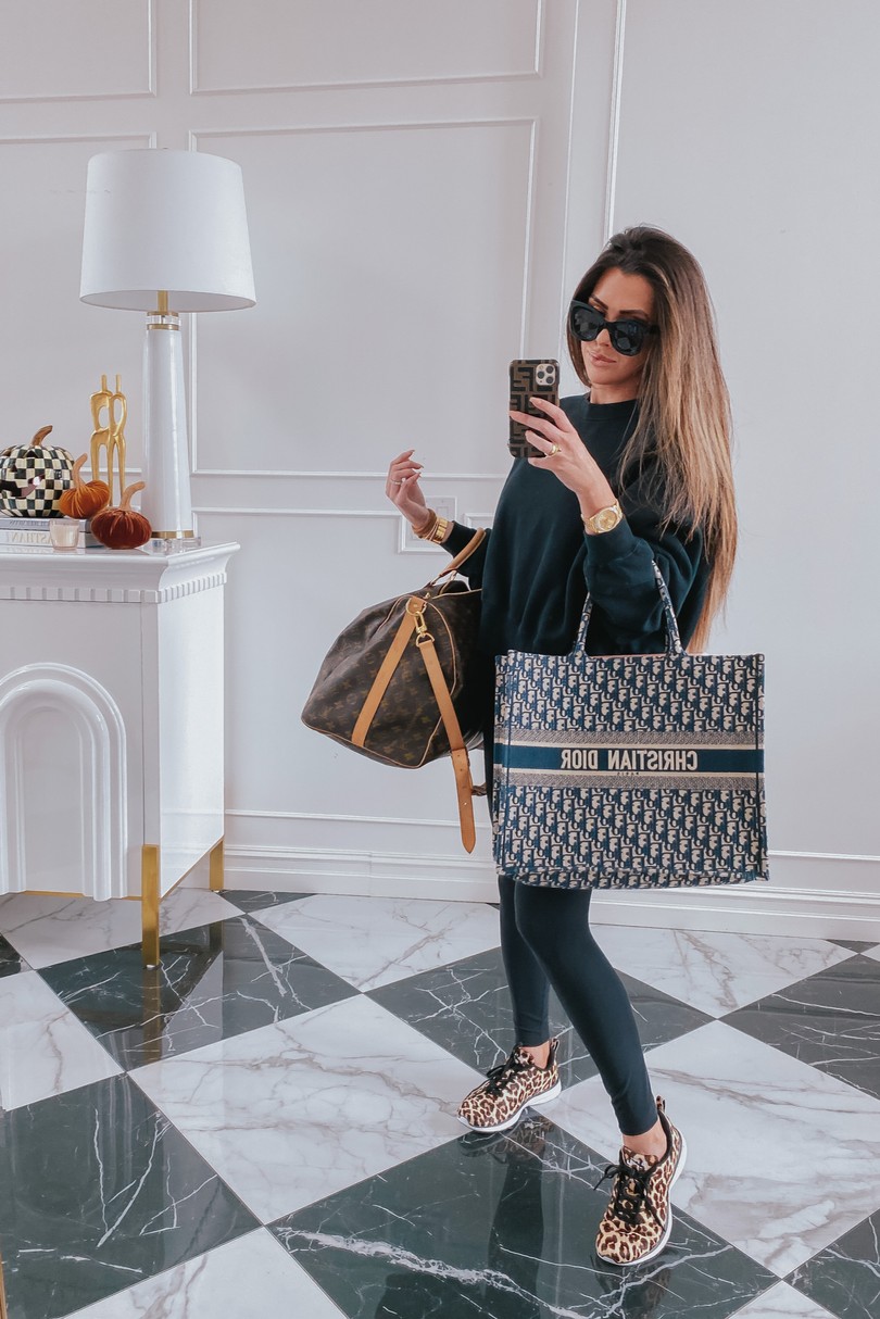 Instagram Recap by popular US lifestyle blog, The Sweetest Thing: image of Emily Gemma wearing Celine sunglasses, Lululemon leggings, leopard print APL sneakers, and holding a Christian Dior bag and Louis Vuitton bag. 