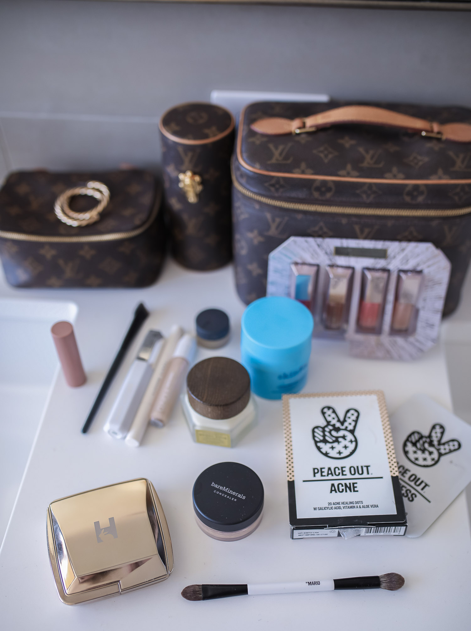 Sephora savings event fall 2020, sephora VIB sale event, beauty blogger sephora favorites fall 2020, emily ann gemma-10 |Sephora Beauty Insider Sale by popular US beauty blog, The Sweetest Thing: image of Louis Vuitton makeup and jewelry cases next to Sephroa beauty products. 