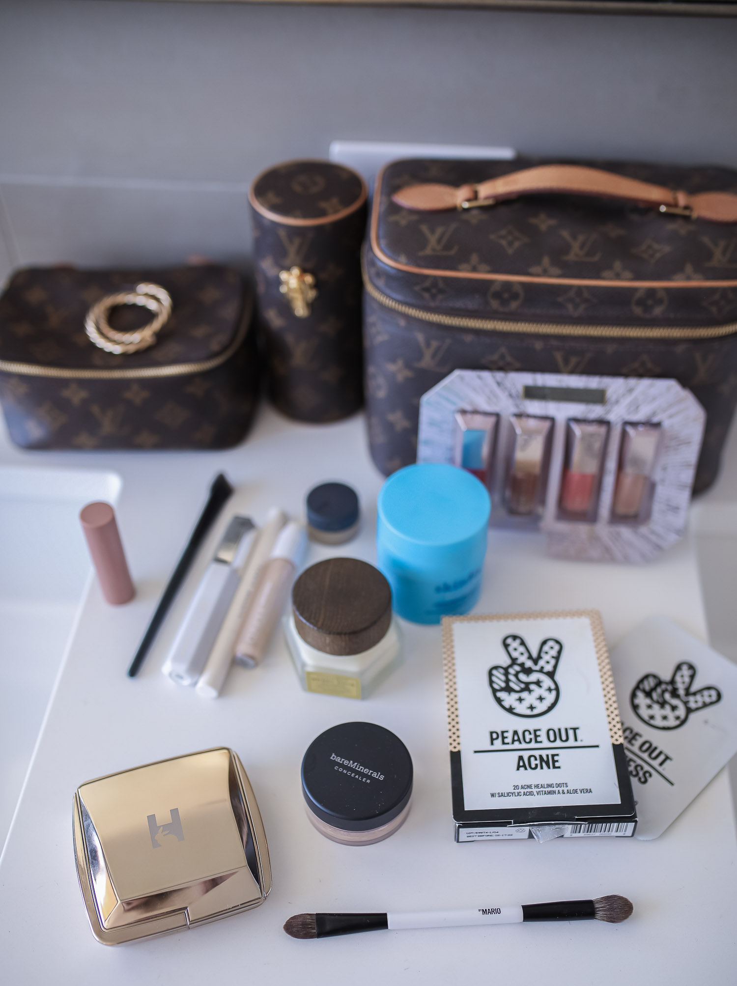 Sephora savings event fall 2020, sephora VIB sale event, beauty blogger sephora favorites fall 2020, emily ann gemma-10 |Sephora Beauty Insider Sale by popular US beauty blog, The Sweetest Thing: image of Louis Vuitton makeup and jewelry cases next to Sephroa beauty products.