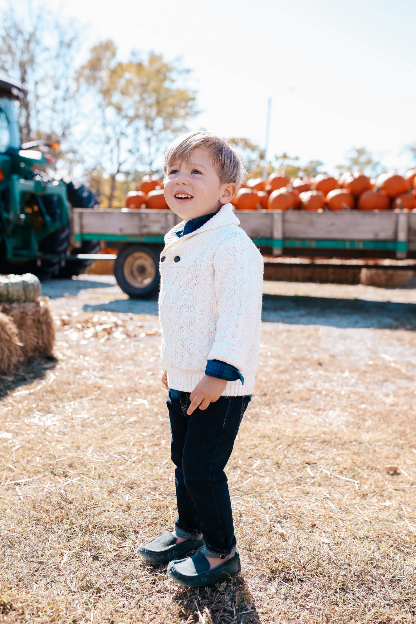 janie and jack kids clothing fall 2020, kids fall fashion 2020, the sweetest thing blog17 |janie and jack kids clothing fall 2020, kids fall fashion 2020, the sweetest thing blog17 | Janie and Jack Kids Clothing by popular US fashion blog, The Sweetest Thing: image of a boy wearing a Janie and Jack PLAID POPLIN SHIRT, Janie and Jack SHAWL COLLAR PULLOVER, Janie and Jack SLIM SELVEDGE JEAN IN MOONLIGHT INDIGO WASH, Janie and Jack LEATHER TRIM BELT, Janie and Jack ARGYLE SOCK, Janie and Jack SUEDE DRIVING SHOE.