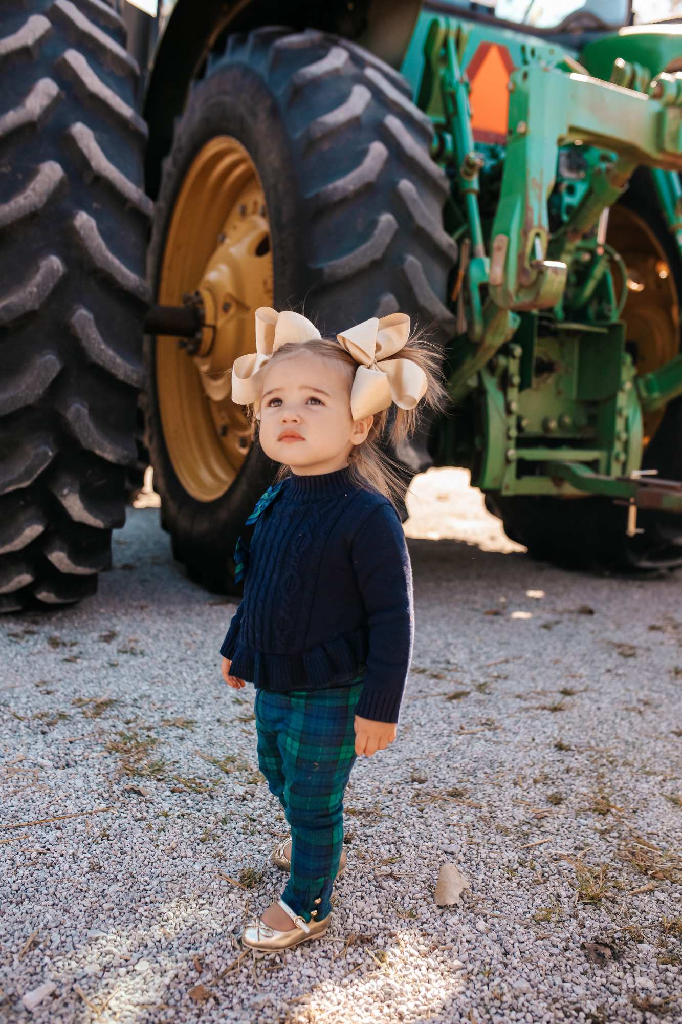janie and jack kids clothing fall 2020, kids fall fashion 2020, the sweetest thing blog17 |janie and jack kids clothing fall 2020, kids fall fashion 2020, the sweetest thing blog17 | Janie and Jack Kids Clothing by popular US fashion blog, The Sweetest Thing: image of a girl wearing a Janie and Jack PEPLUM BOW SWEATER, Janie and Jack PLAID PONTE BUTTON CUFF PANT, and Janie and Jack METALLIC BOW FLAT.
