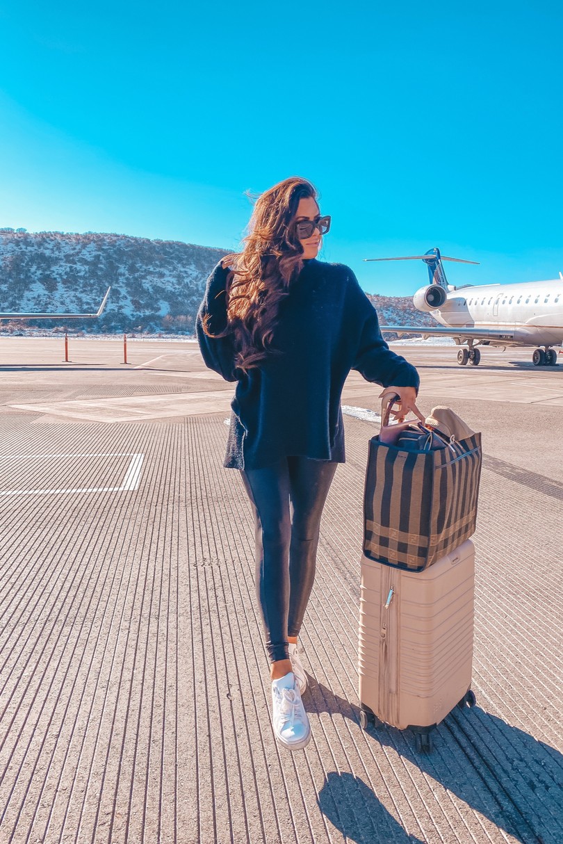 airport travel style, airport fashion casual Pinterest, travel outfit idea leggings sweater, fendi sunshine shopper, Emily Gemma, fall fashion 2021