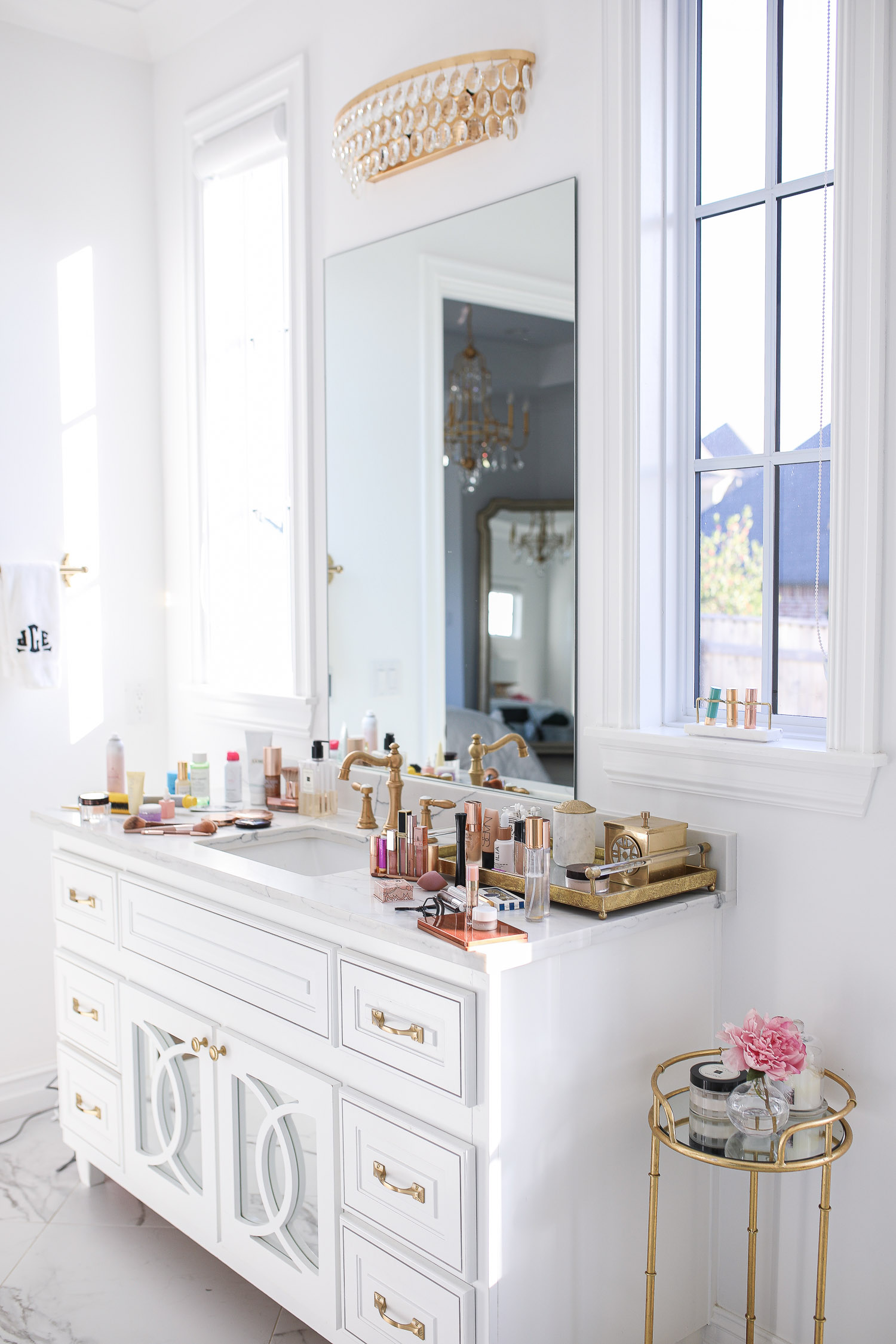 Sephora savings event fall 2020, beauty blogger sephora favorites fall 2020, emily ann gemma |Sephora Beauty Insider Sale by popular US beauty blog, The Sweetest Thing: image of bathroom vanity covered in Sephora beauty products. 