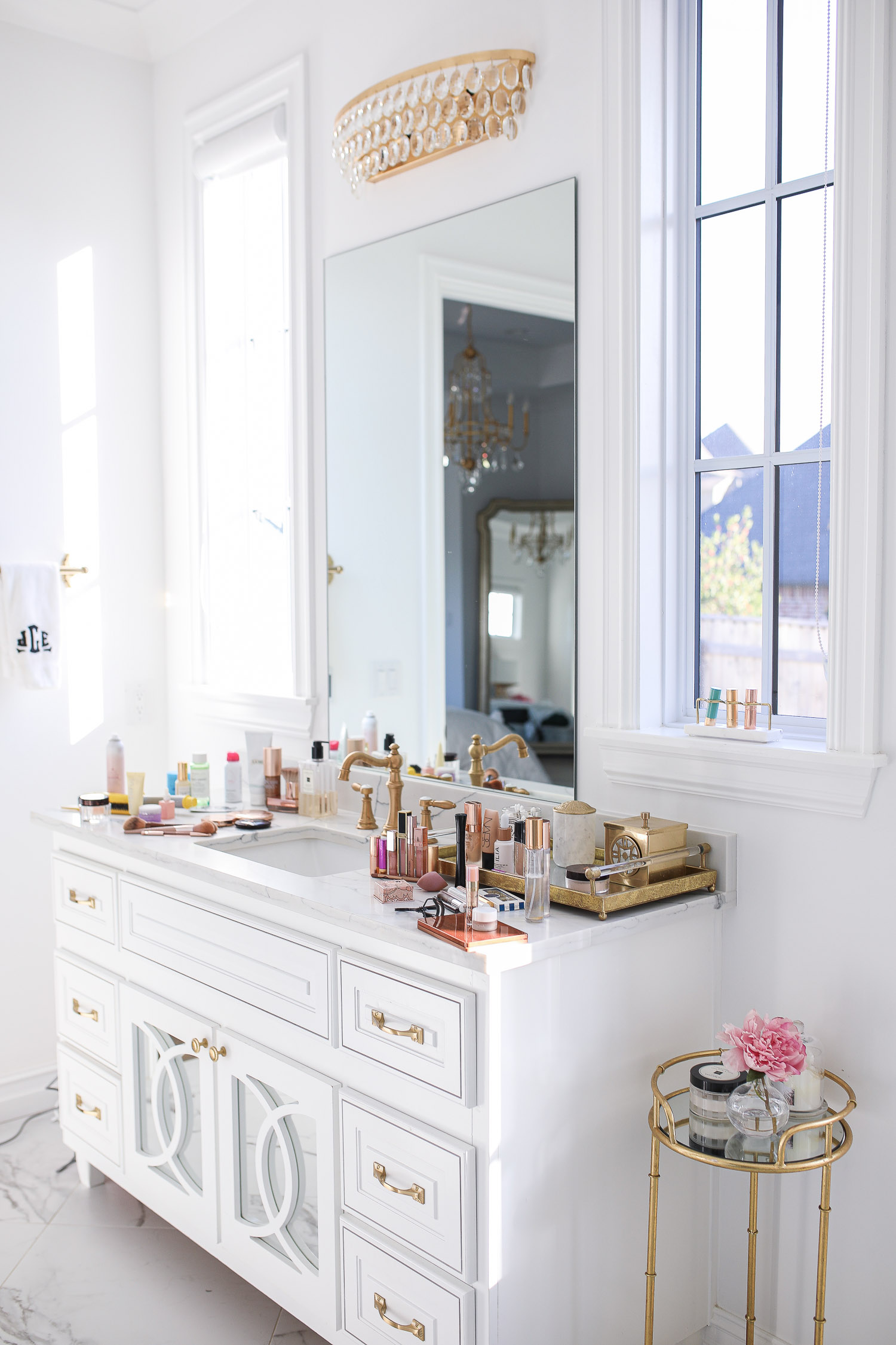 Sephora savings event fall 2020, beauty blogger sephora favorites fall 2020, emily ann gemma |Sephora Beauty Insider Sale by popular US beauty blog, The Sweetest Thing: image of bathroom vanity covered in Sephora beauty products.