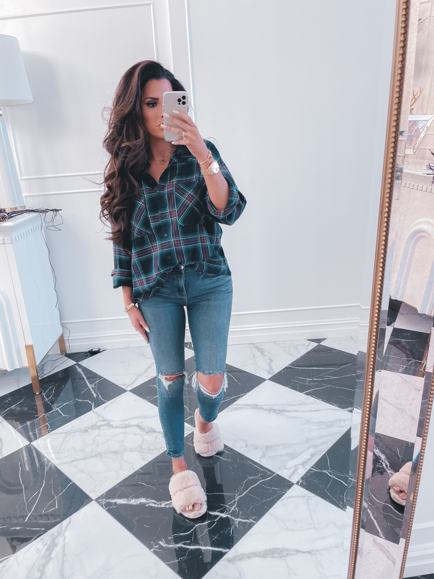best black friday cyber monday sales 2020, top black friday sales 2020, emily gemma1 |2020 Black Friday Deals by popular US life and style blog, The Sweetest Thing: image of Emily Gemma wearing a plaid button up shirt, distressed denim, and fuzzy pink sandal slippers. 