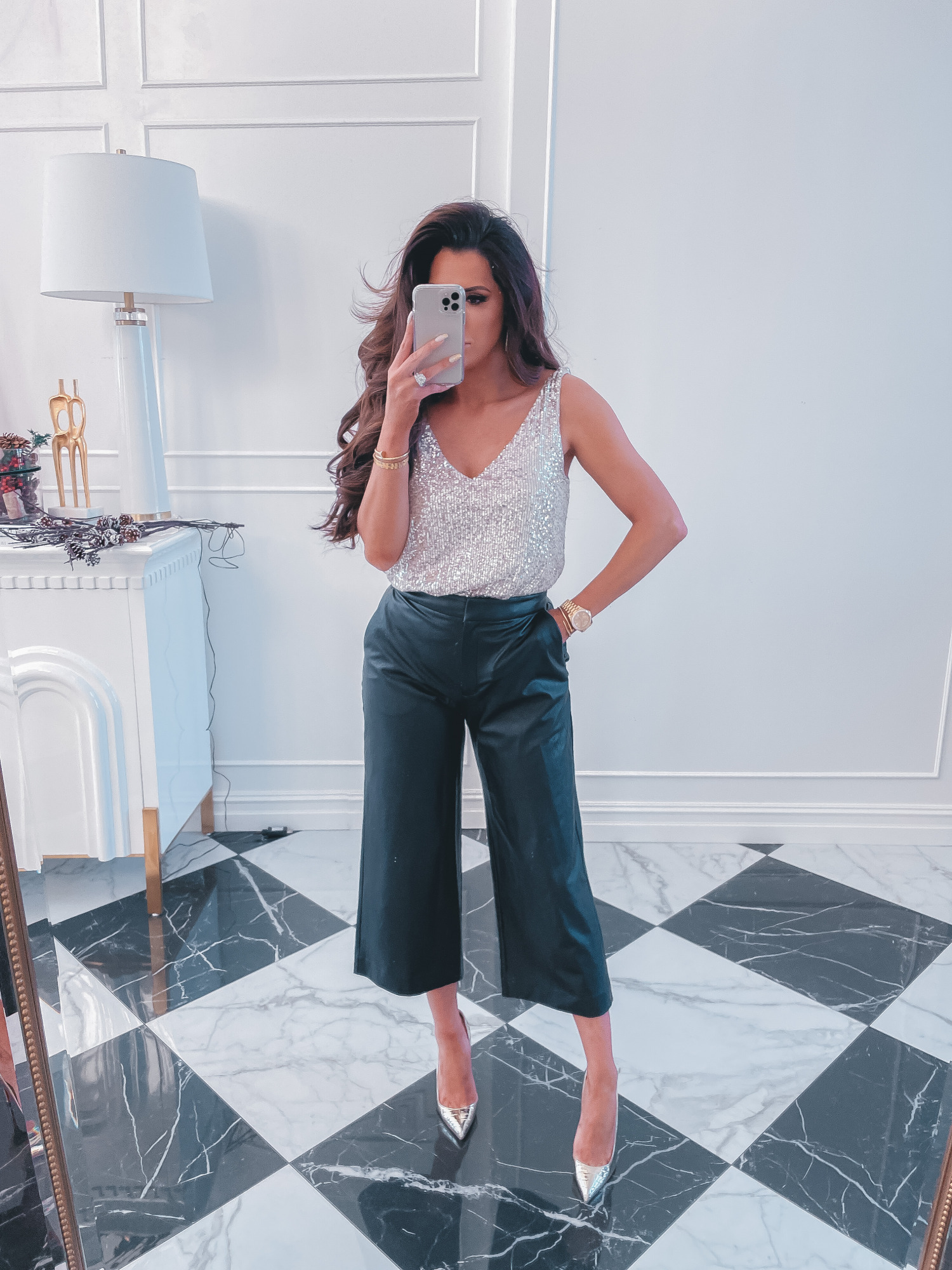 best black friday cyber monday sales 2020, top black friday sales 2020, emily gemma14 |2020 Black Friday Deals by popular US life and style blog, The Sweetest Thing: image of Emily Gemma wearing a silver sequin tank top, black leather culottes pants, and silver stiletto heels. 