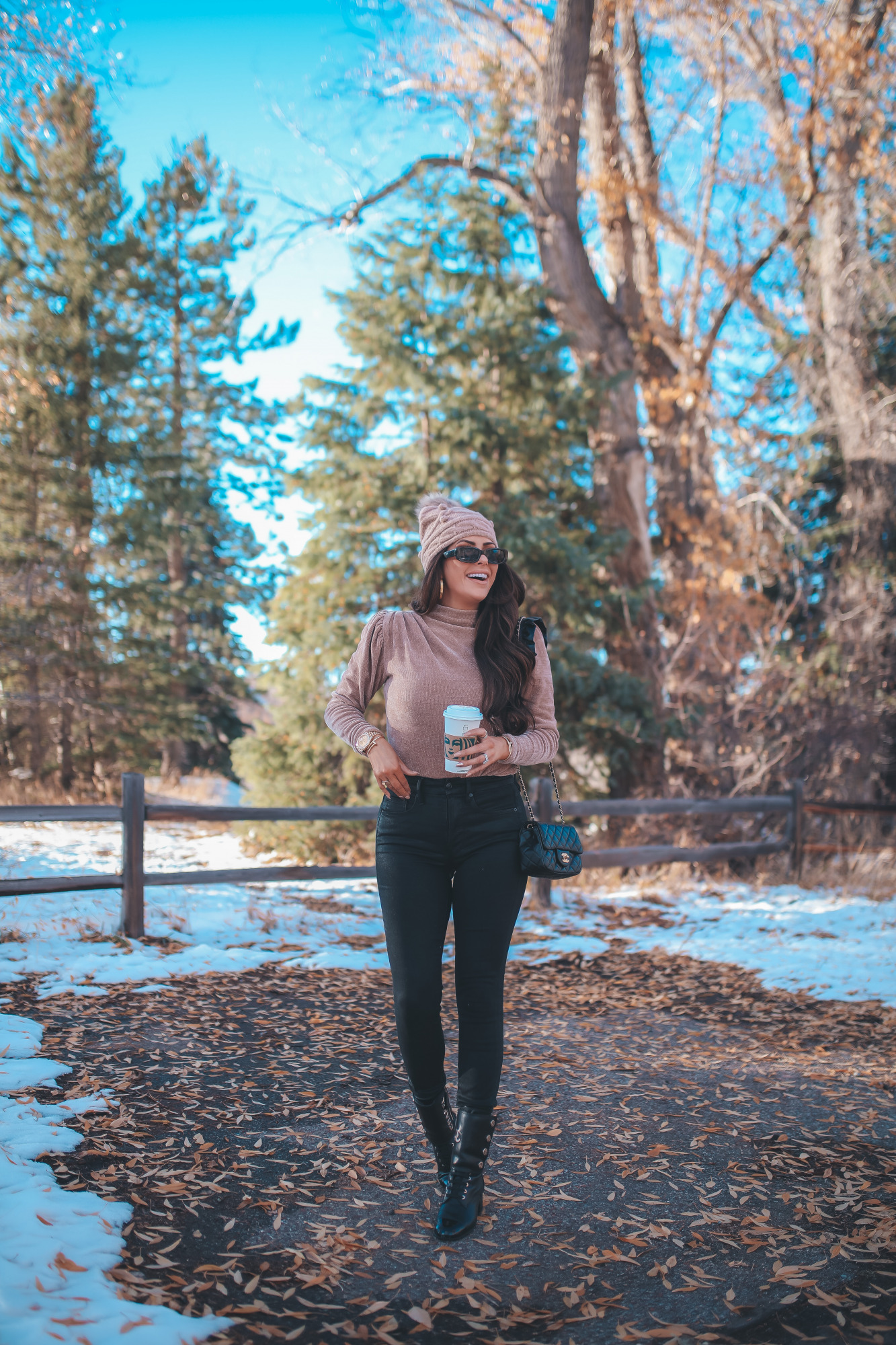 black chanel combat boots, express black friday sales 2020, emily gemma4 |November Instagram Recap by popular US lifestyle blog, The Sweetest Thing: image of Emily Gemma wearing a Express turtleneck, Express black leggings, tan pom beanie, black sunglasses, and black Chanel ankle boots. 