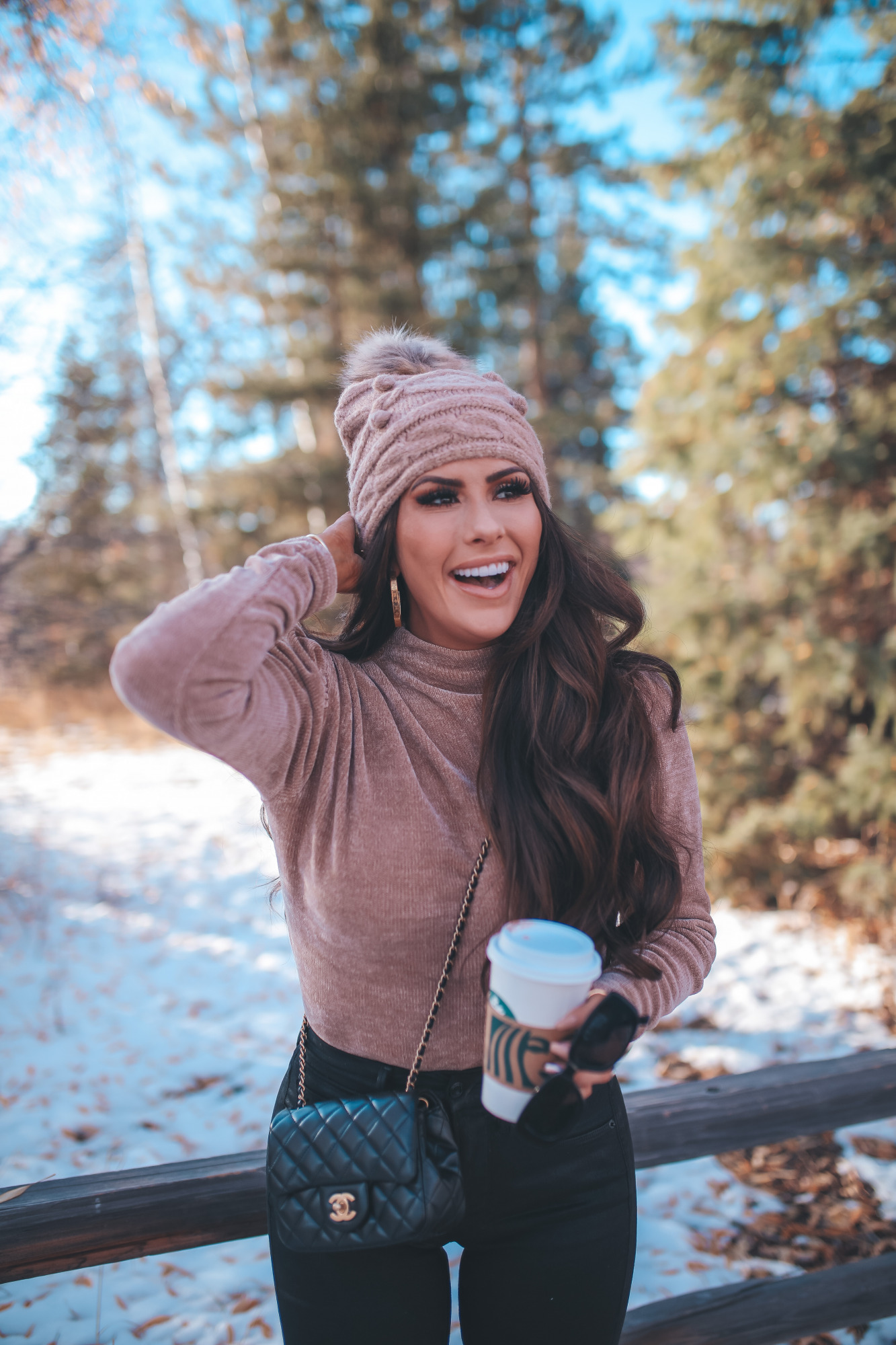 express fall fashion 2020, express black friday sales 2020, emily gemma3 |Express Clothing for Women by popular US fashion blog, The Sweetest Thing: image of Emily Gemma standing outside int he mountains and wearing a Express sweater, Express jeans, Chanel combat boots, Express beanie, Express sunglasses, Rolex watch, and a Chanel bag.  