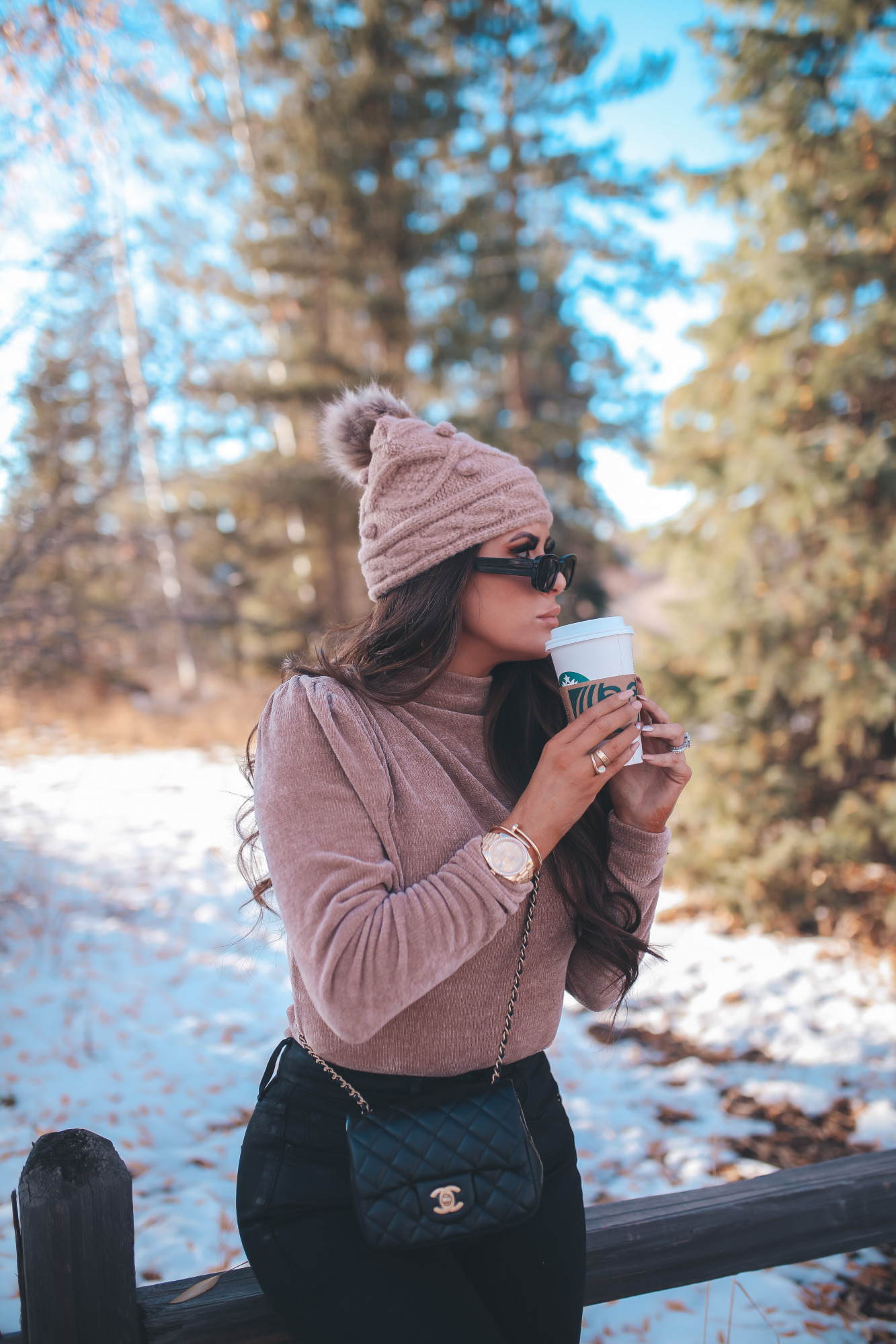 express fall fashion 2020, express black friday sales 2020, emily gemma3 |Express Clothing for Women by popular US fashion blog, The Sweetest Thing: image of Emily Gemma standing outside int he mountains and wearing a Express sweater, Express jeans, Chanel combat boots, Express beanie, Express sunglasses, Rolex watch, and a Chanel bag.  