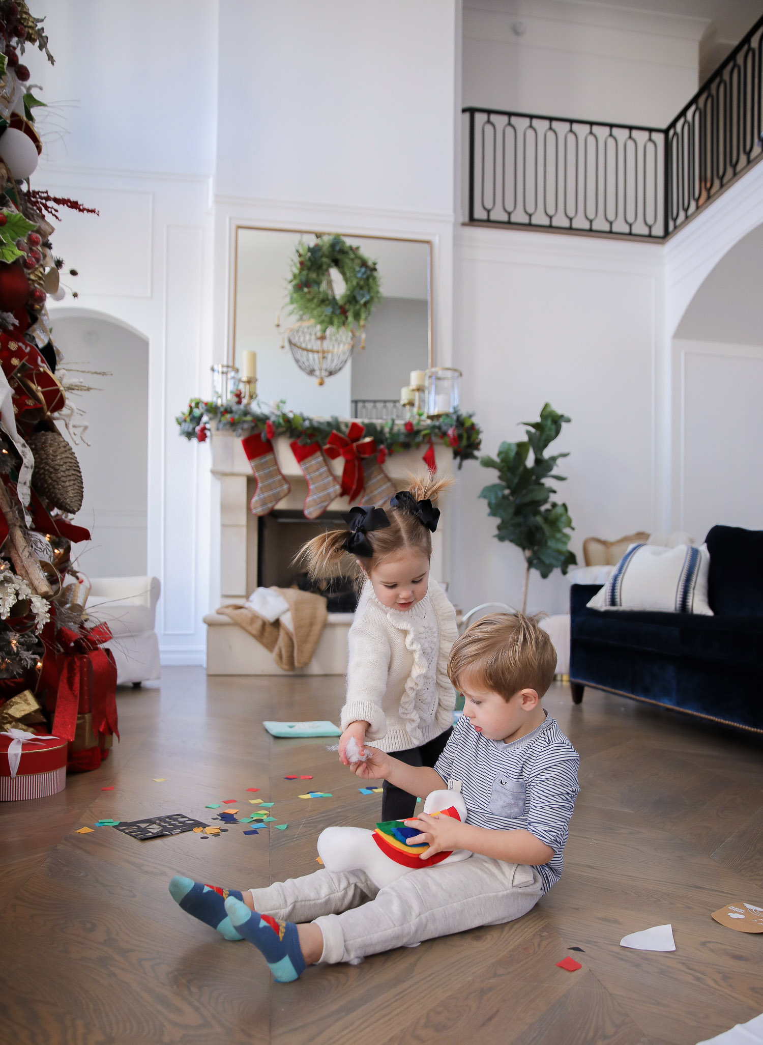 Educational Gift Ideas for Kids by popular US lifestyle blog, The Sweetest Thing: image of a boy and girl playing with KiwiCo toys. 
