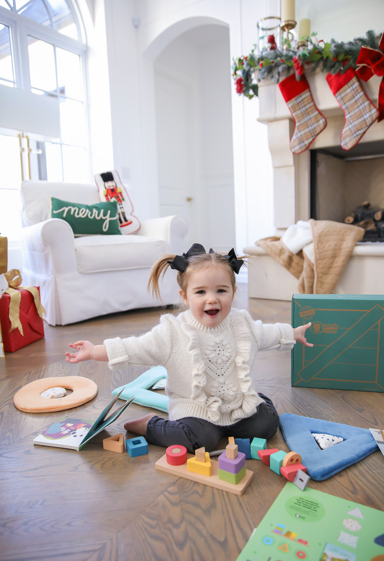 Educational Gift Ideas for Kids by popular US lifestyle blog, The Sweetest Thing: image of a girl playing with KiwiCo toys. 