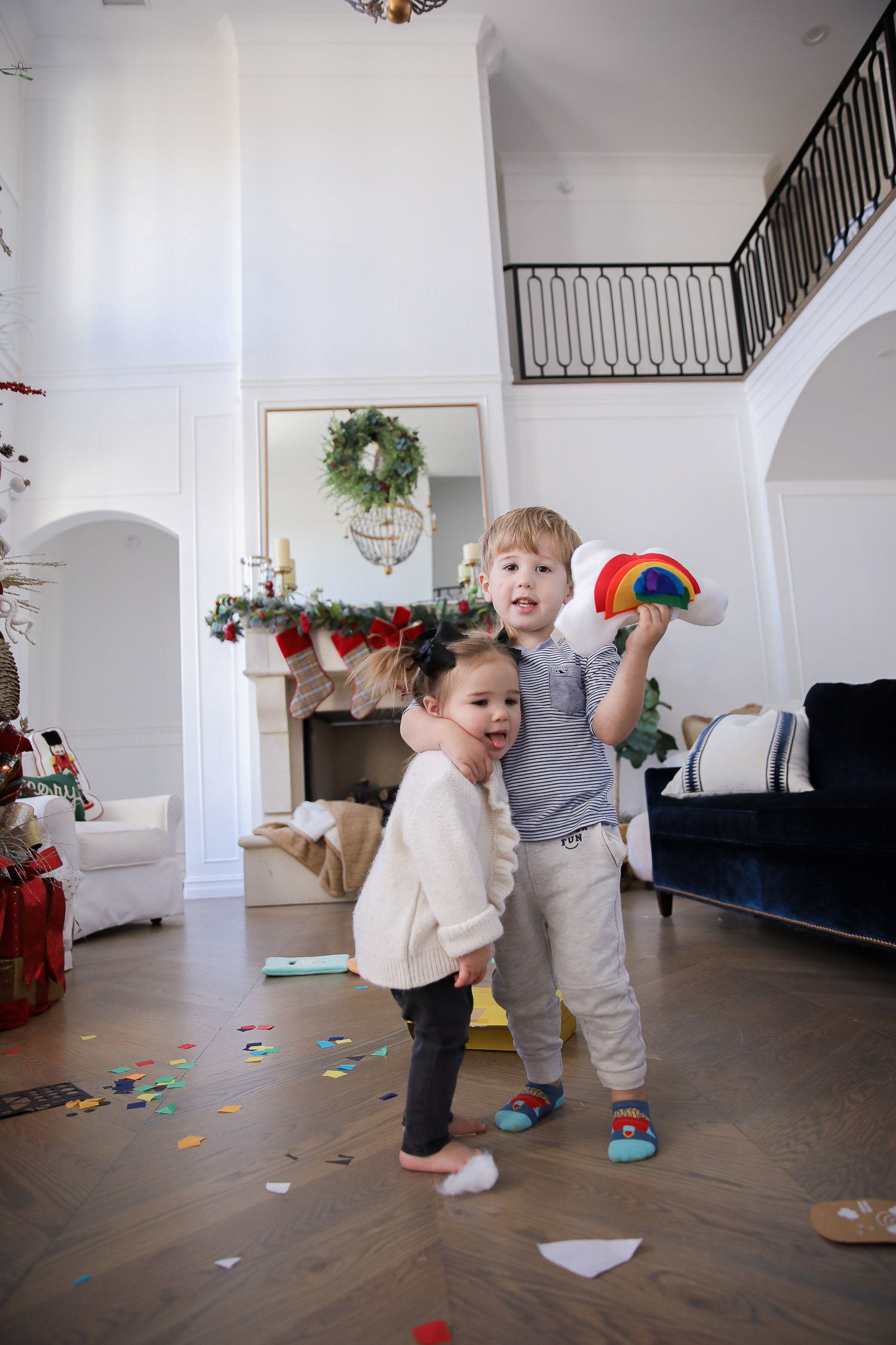 Educational Gift Ideas for Kids by popular US lifestyle blog, The Sweetest Thing: image of a boy and girl playing with KiwiCo toys. 