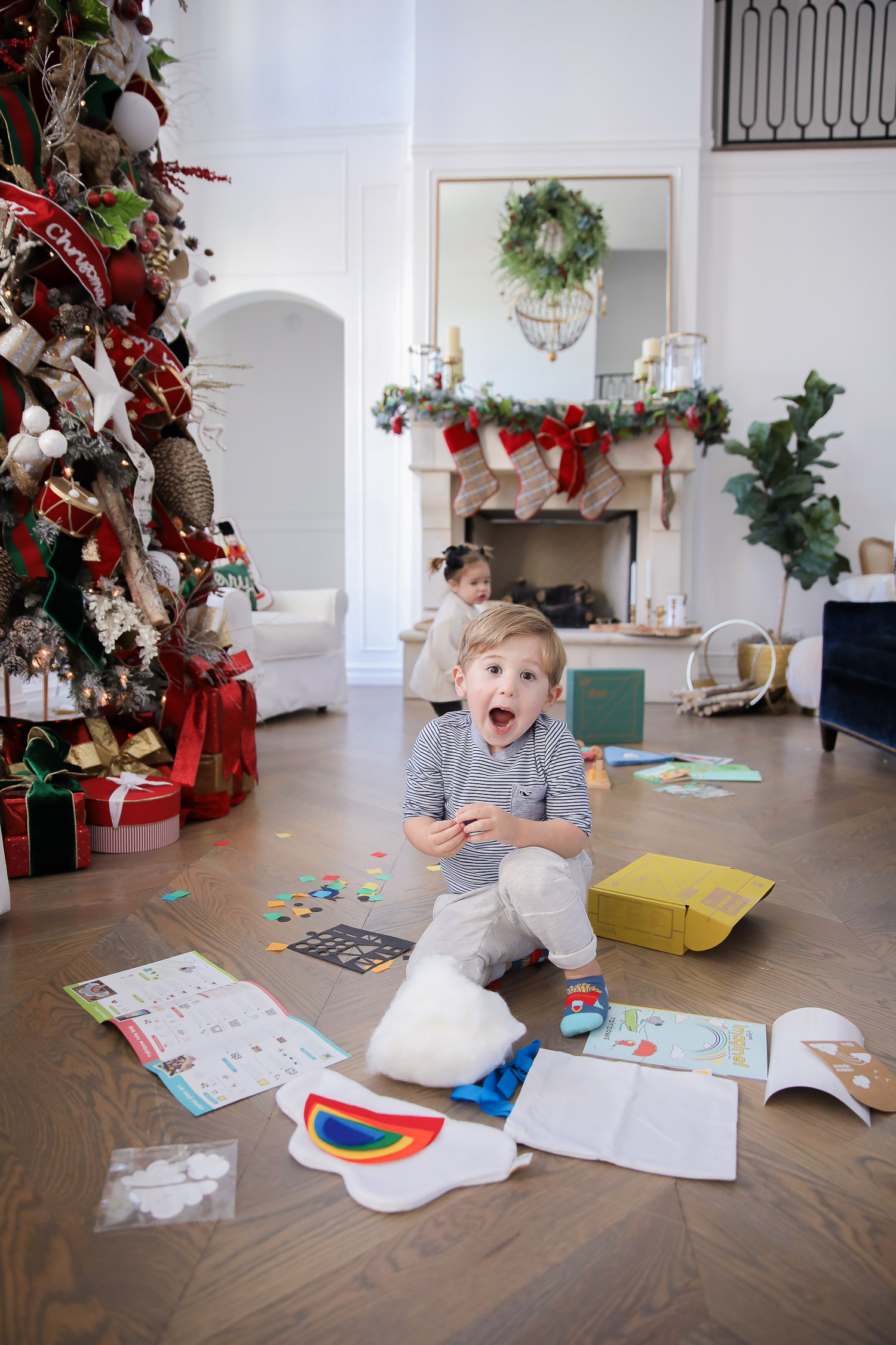 Educational Gift Ideas for Kids by popular US lifestyle blog, The Sweetest Thing: image of a boy and girl playing with KiwiCo toys. 