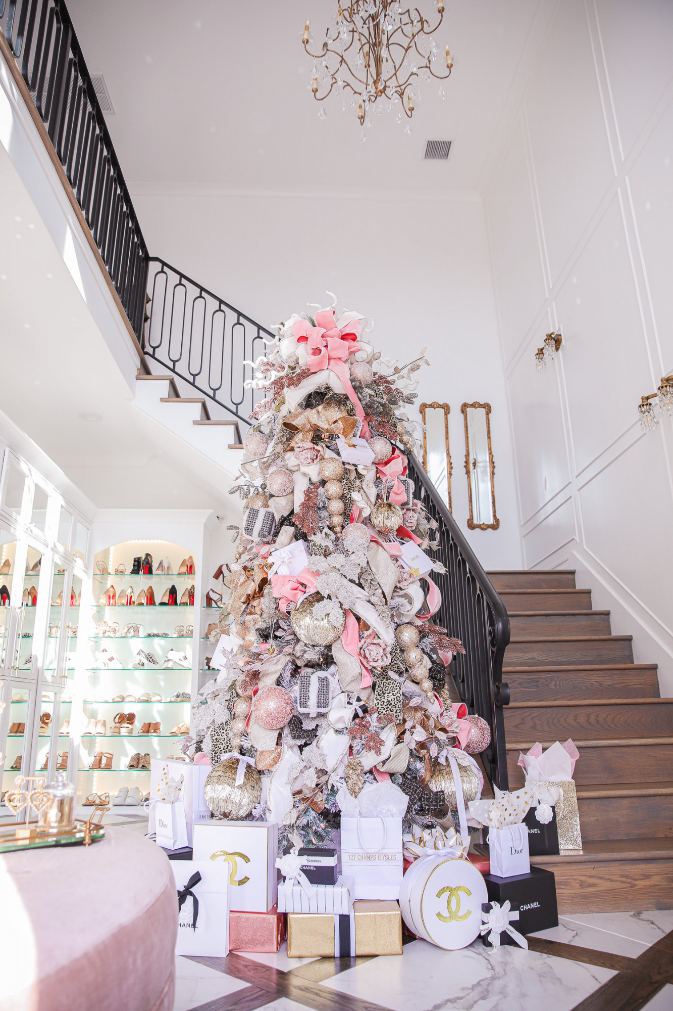 two story closet pinterest, designer chanel christmas tree, unique christmas trees, shop hello holidays, emily gemma christmas tree |Pink and Gold Christmas Tree by popular US life and style blog, The Sweetest Thing: image of a two story closet decorated with pink and gold Christmas Tree with high end retailer bags underneath. 