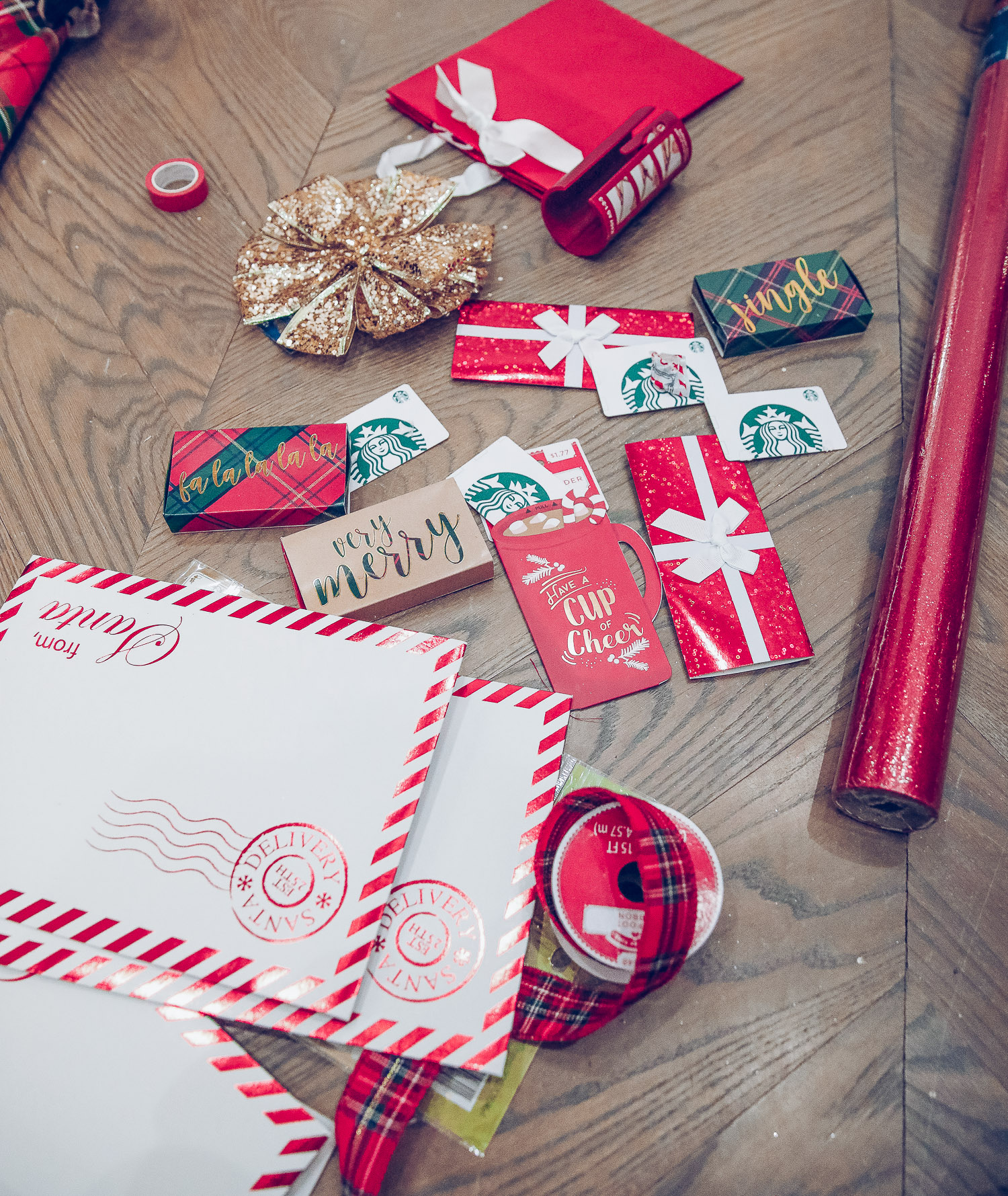 walmart gift wrap christmas 2020, shop hello holidays christmas tree, magnetic me PJs, emily ann gemma-10 |Gift Wrapping Ideas by popular US life and style blog, The Sweetest Thing: image of gift card envelops, red gift bag, gold gift bow, red wrapping paper and a plaid ribbon. 