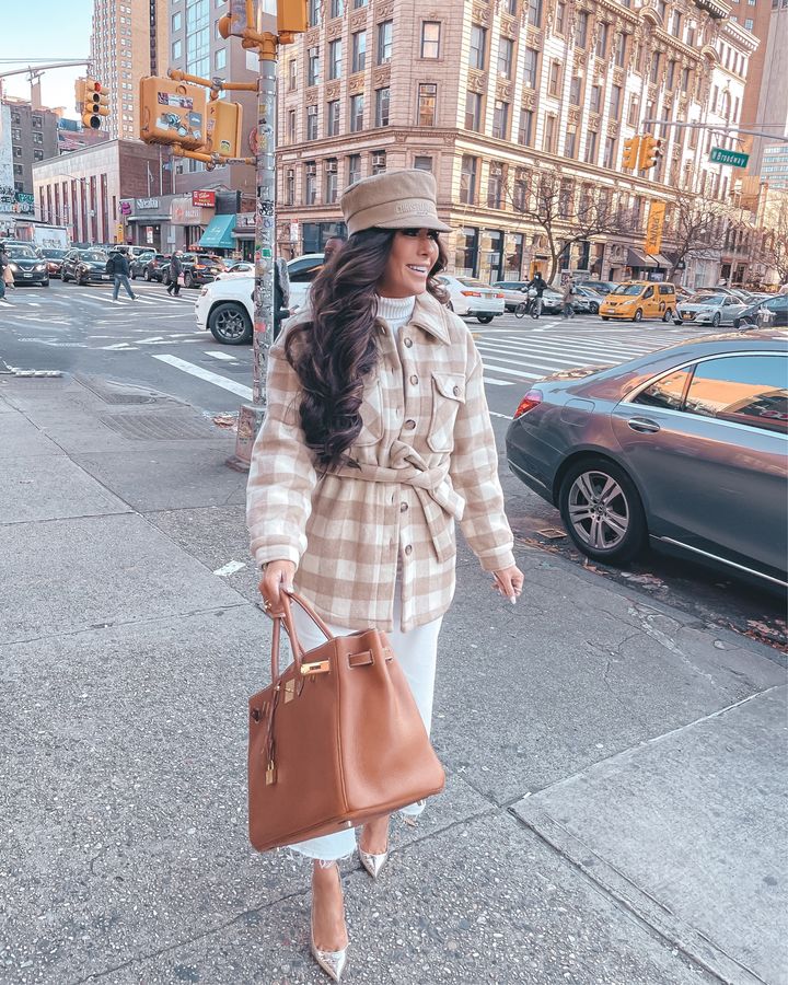 shacket, gold christian louboutin pumps, christian dior cap, Hermes birkin, white denim, turtleneck sweater, New York city outfit ideas, Emily gemma