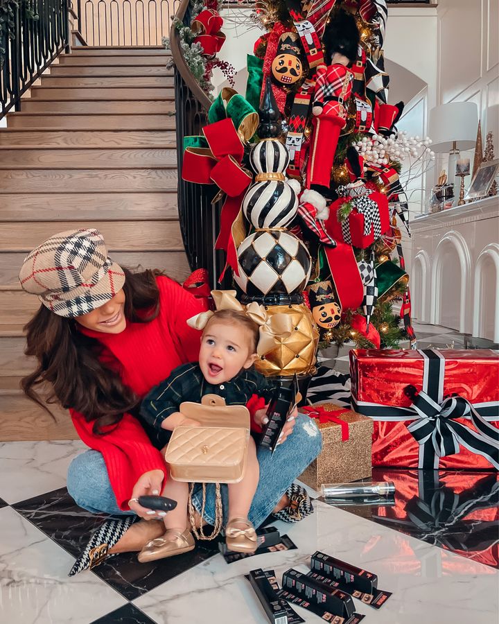 Emily Gemma, holiday decor ideas, Emily gemma home, hello holidays christmas decor, Burberry cap, red sweater, holiday outfit ideas