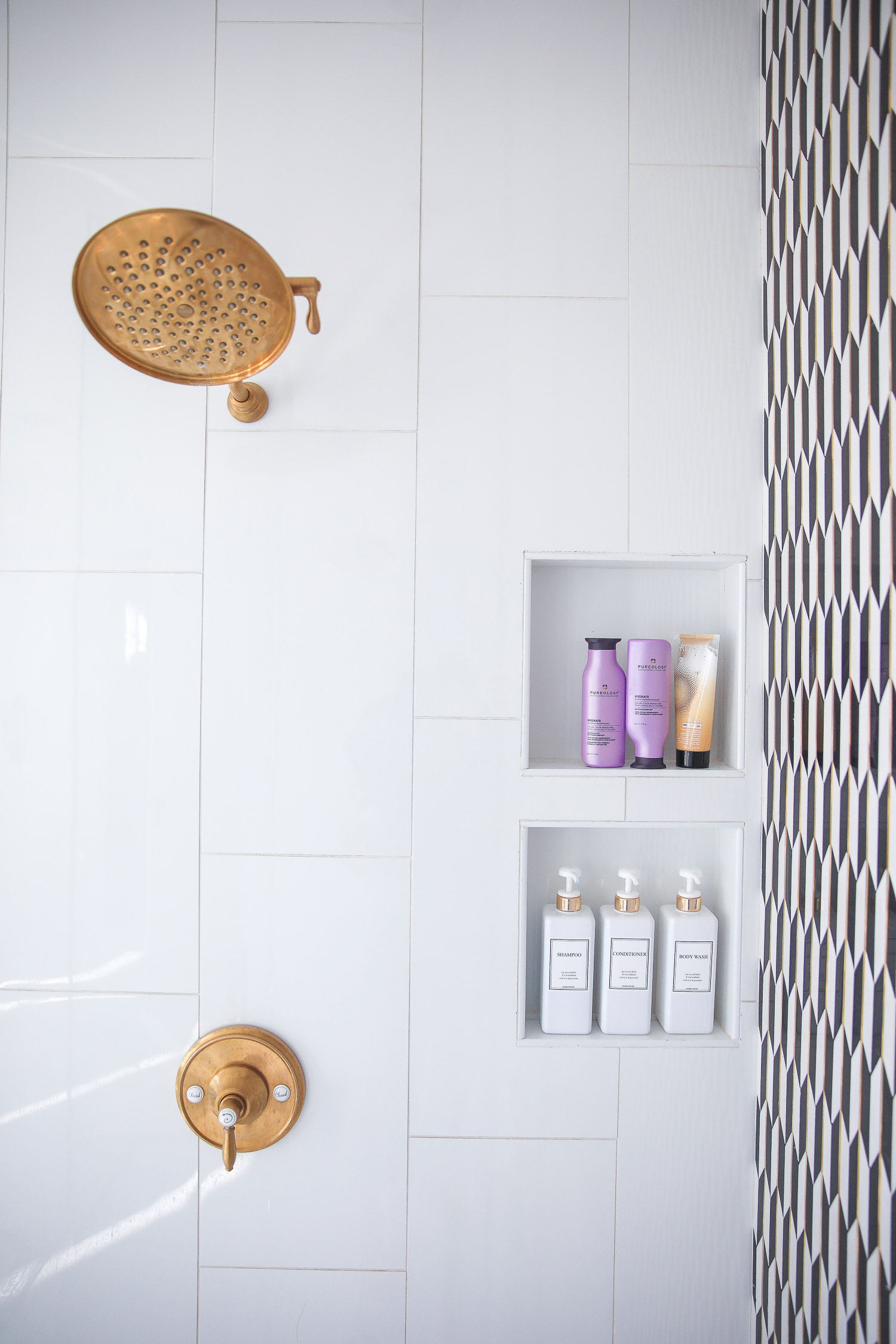 hair dot com, best hair products for long hair and extensions, Purology shampoo and conditioner, emily gemma, the sweetest thing blog |Hair Products by popular US beauty blog, The Sweetest Thing: image of a walk-in shower stocked with Pureology and Dae hair products.