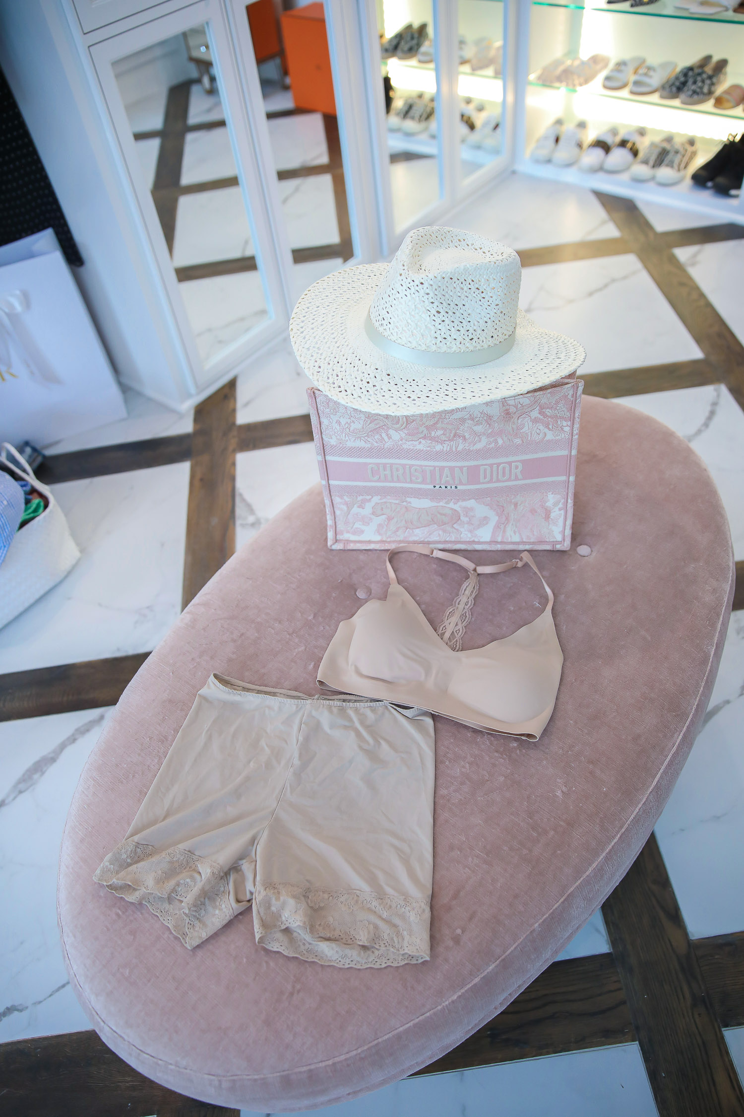 Nordstrom Must Haves by popular US fashion blog, The Sweetest Thing: image of a white straw sun hat, tan padded bralette and tan shorts. 