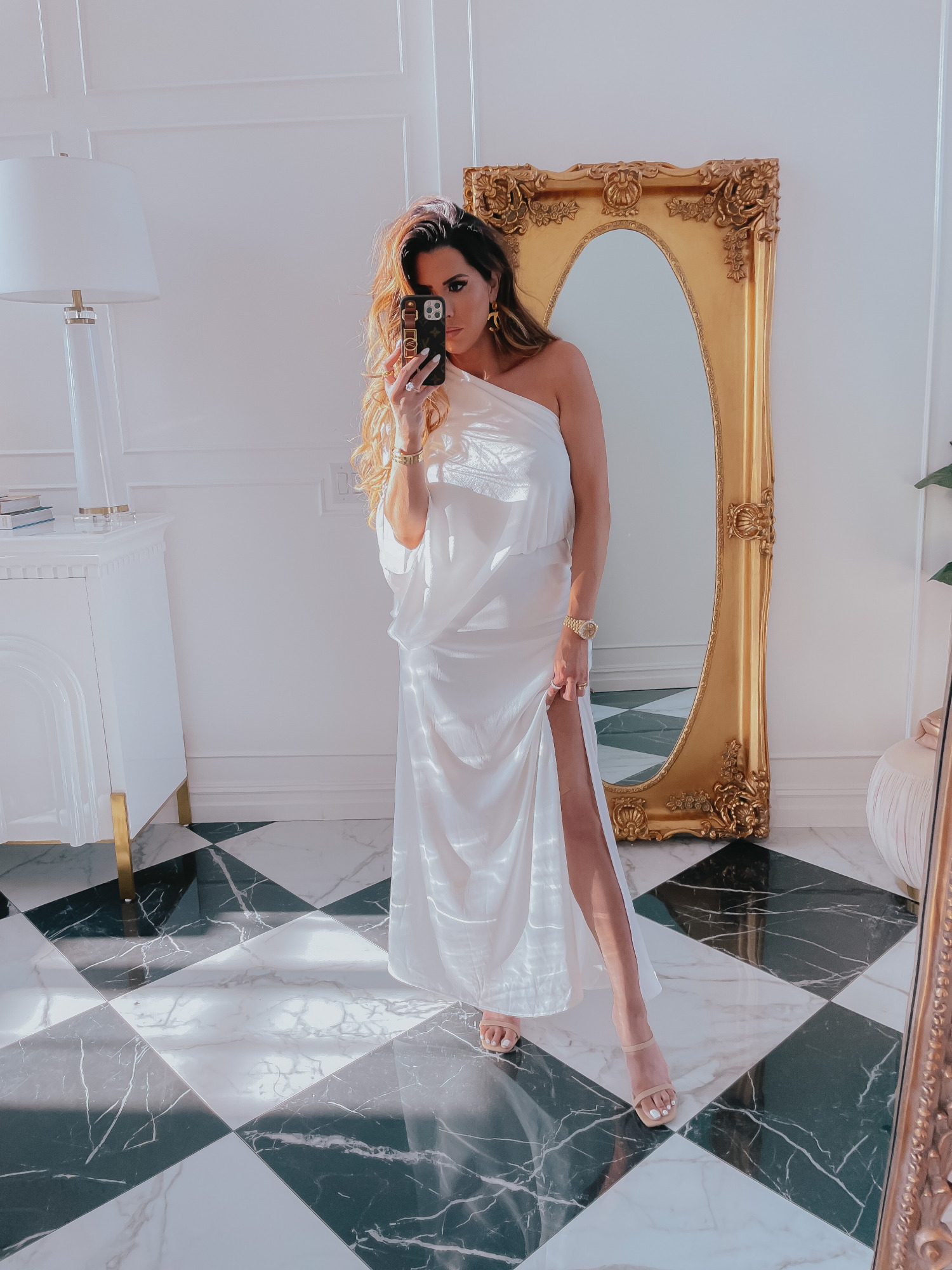 White Summer Dress, Nude Heels, Bachelorette Outfit Ideas, Bridal Shower Dress, Spring Style 2021, Emily Gemma |Spring Fashion by popular US fashion blog, The Sweetest Thing: image of Emily Gemma wearing aRed Dress  white one shoulder high slit dress and tan heel sandals. 