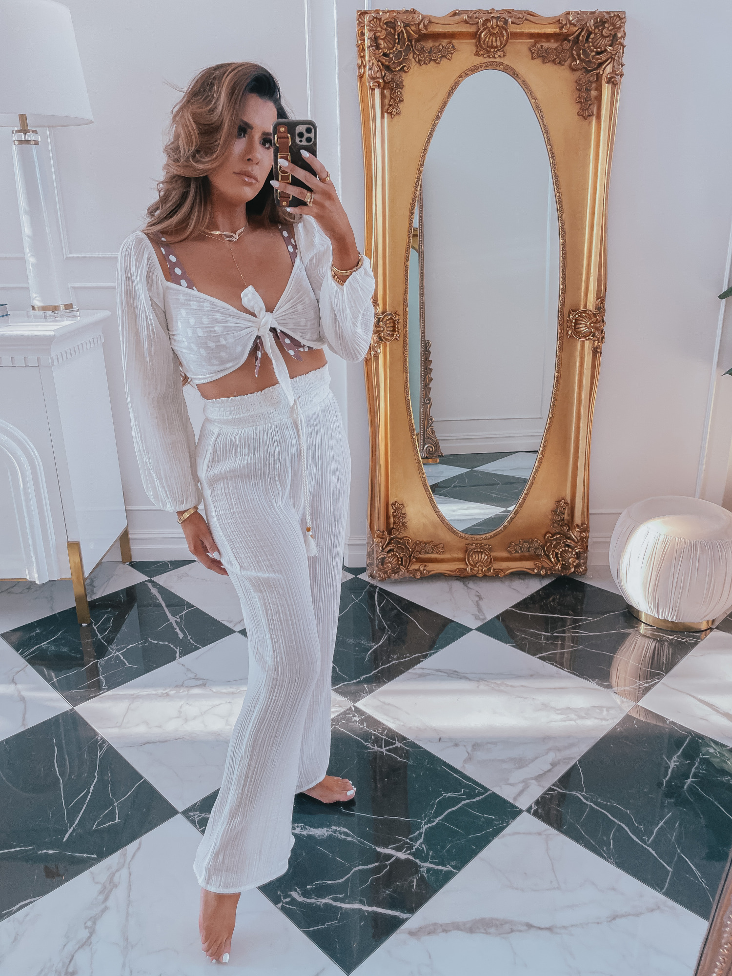LTK Day Sale Spring 2021, Abercrombie swimsuit review 2021, emily gemma|Best Sales This Weekend by popular US fashion blog, The Sweetest Thing: image of Emily Gemma wearing a white gauzy two piece coverup. 