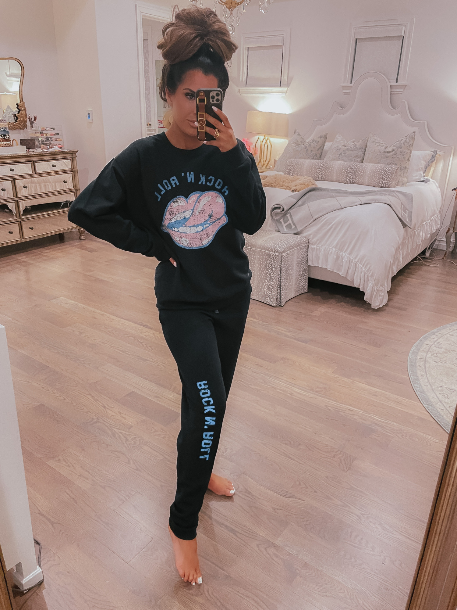 Vici Try On by popular US fashion blog, The Sweetest Thing: image of Emily Gemma wearing a Vici rock and sweatshirt and sweat pants set. 