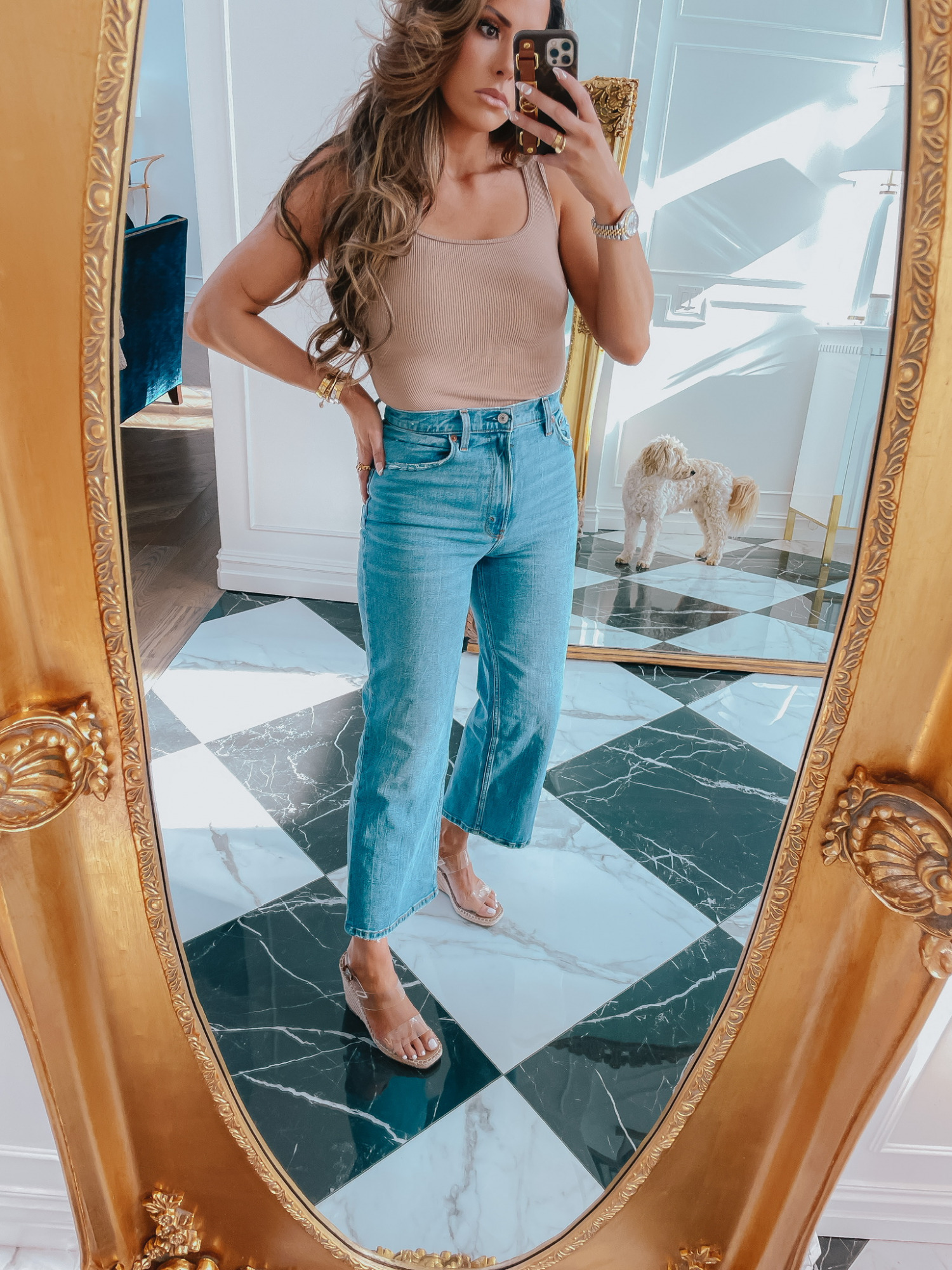 abercrombie-ltk-day-sale-summer-casual-oufit-emily-ann-gemma | LTK Sales by popular US fashion blog, The Sweetest Thing: image of Emily Gemma wearing a tan tank, jeans, and brown strap espadrilles. 