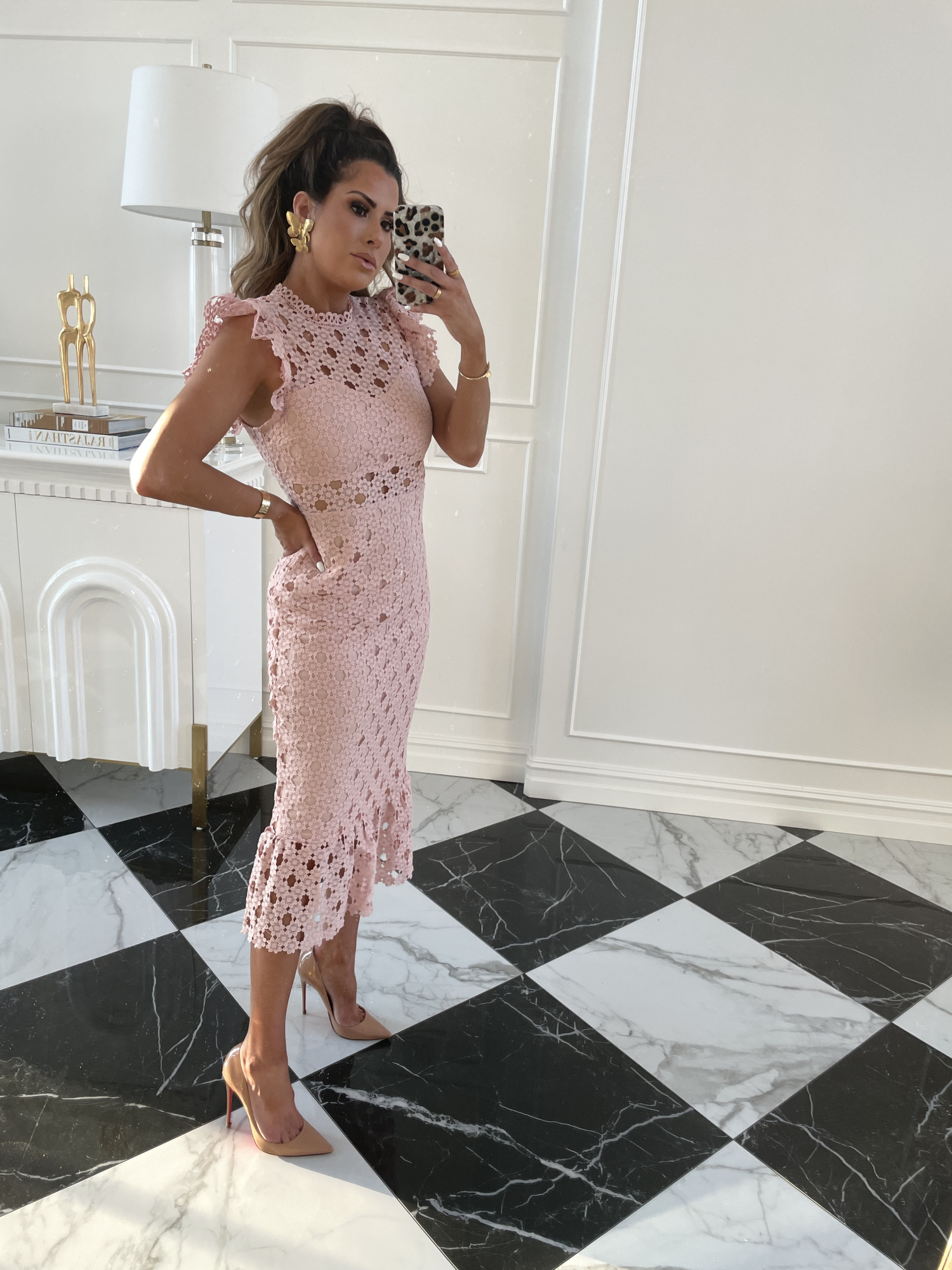 Instagram Recap by popular US life and style blog, The Sweetest Thing: image of Emily Gemma wearing a Red Dress pink lace ruffle hem dress, gold statement earrings, and tan heels