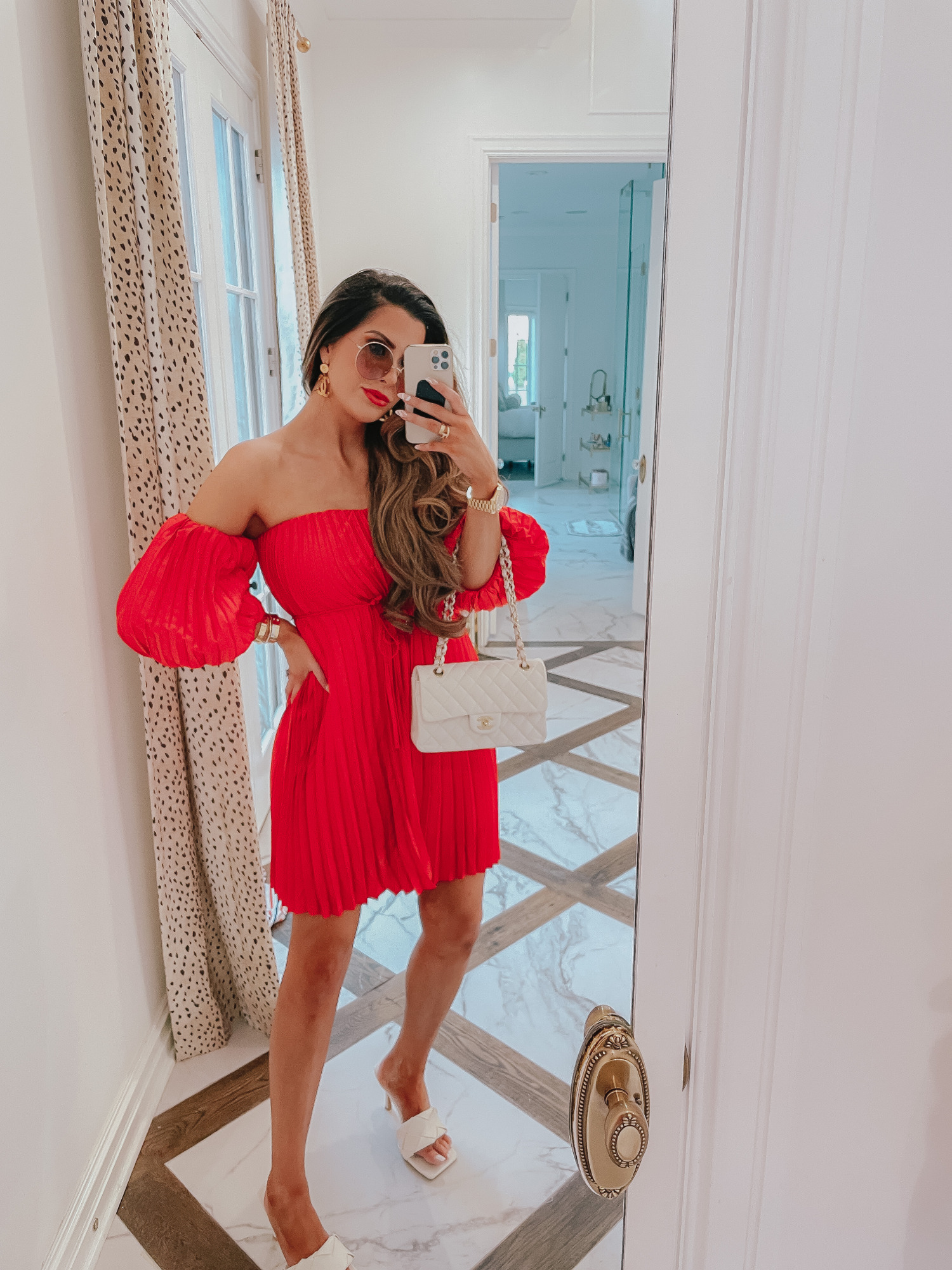 july 4 outfit inspiration 2021, pinterest july 4 outfit, gucci red lipstick, Emily gemma | June Instagram Recap by popular US fashion blog, The Sweetest Thing: image of Emily Gemma wearing. red off the shoulder pleated mini dress and white heel slide sandals. 