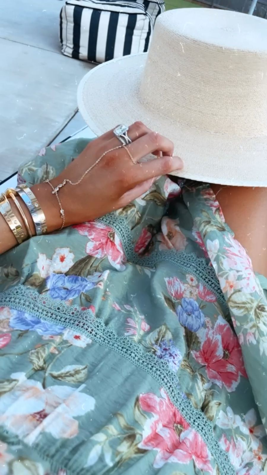 best summer dresses, affordable summer dresses 2021, wedding guest dresses, summer hats, gucci handbag, Emily ann gemma | June Instagram Recap by popular US fashion blog, The Sweetest Thing: image of Emily Gemma wearing a floral print midi dress and holding a white straw boater hat.  