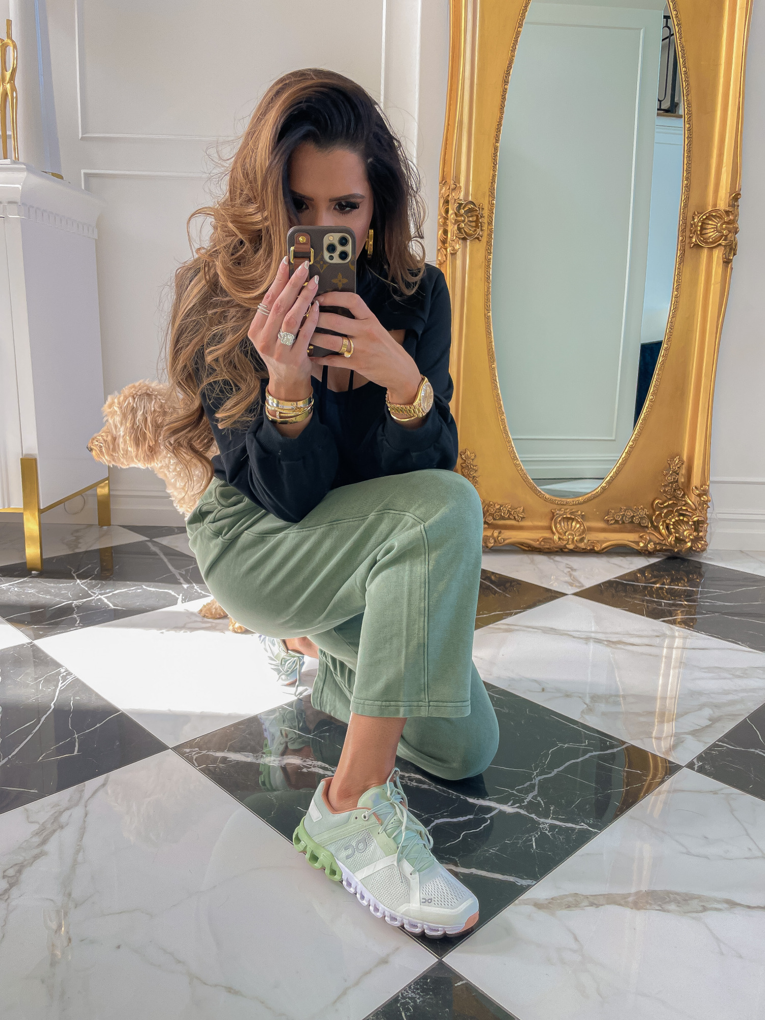 dstrom Anniversary Sale 2021 Picks, best of NSALE 2021, Nordstrom sale on cloud shoes reivew, Emily gemma | Instagram Recap by popular US life and style blog, The Sweetest Thing: image of Emily Gemma wearing a black cutout sweatshirt, green cargo pants, and OnCloud athletic shoes. 