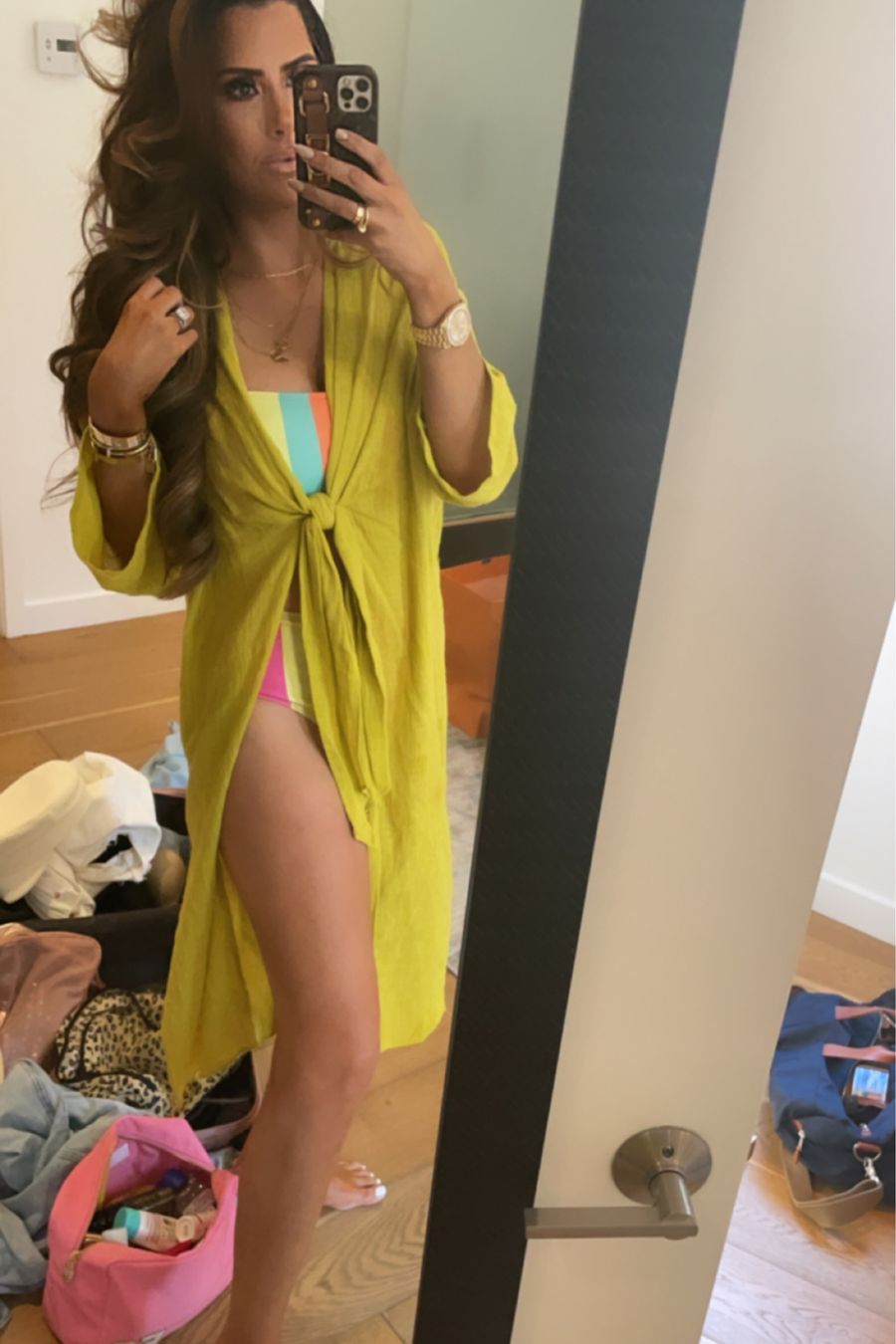 Affordable Swimsuits, Beach Cover UP, Emily Ann Gemma, Shein Swimsuit, Colorful Swimsuit | Instagram Recap by popular US life and style blog, The Sweetest Thing: image of Emily Gemma wearing a colorful stripe swimsuit with a green linen coverup. 