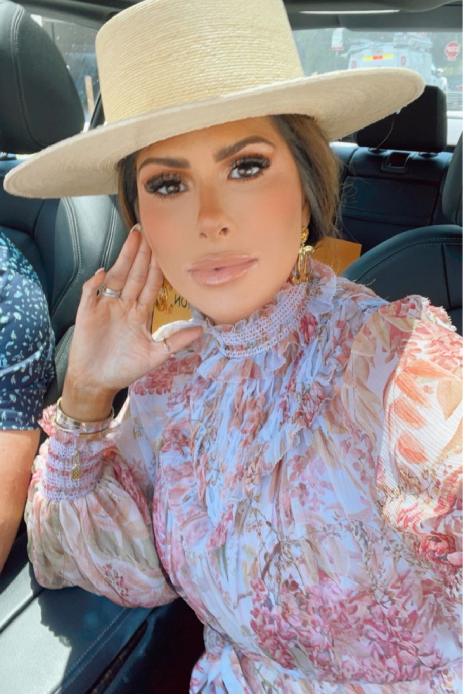 Emily Ann gemma, Emily Gemma MAkeup Routine, Zimmermann Floral Dress, Boater Hat, Summer Outfit Ideas | Instagram Recap by popular US life and style blog, The Sweetest Thing: image of Emily Gemma wearing a straw Anthropologie hat and floral print Zimmerman dress. 
