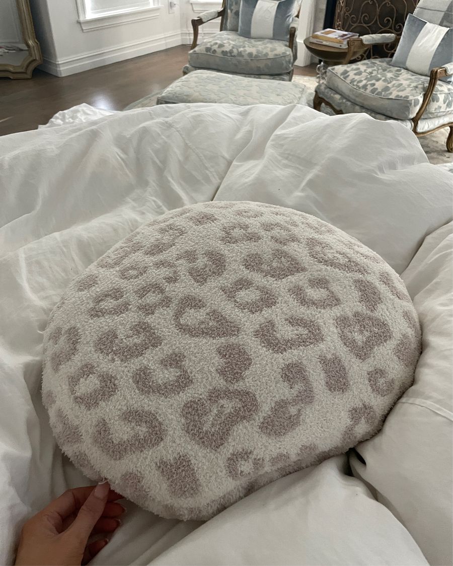 Nordstrom Sale Home Must Haves, Barefoot Dreams, Barefoot Dreams Blanket, Barefoot Dreams Pillow, Emily Ann gemma Home | Instagram Recap by popular US life and style blog, The Sweetest Thing: image of a Emily Gemma holding a Barefoot Dreams pillow in her bed. 