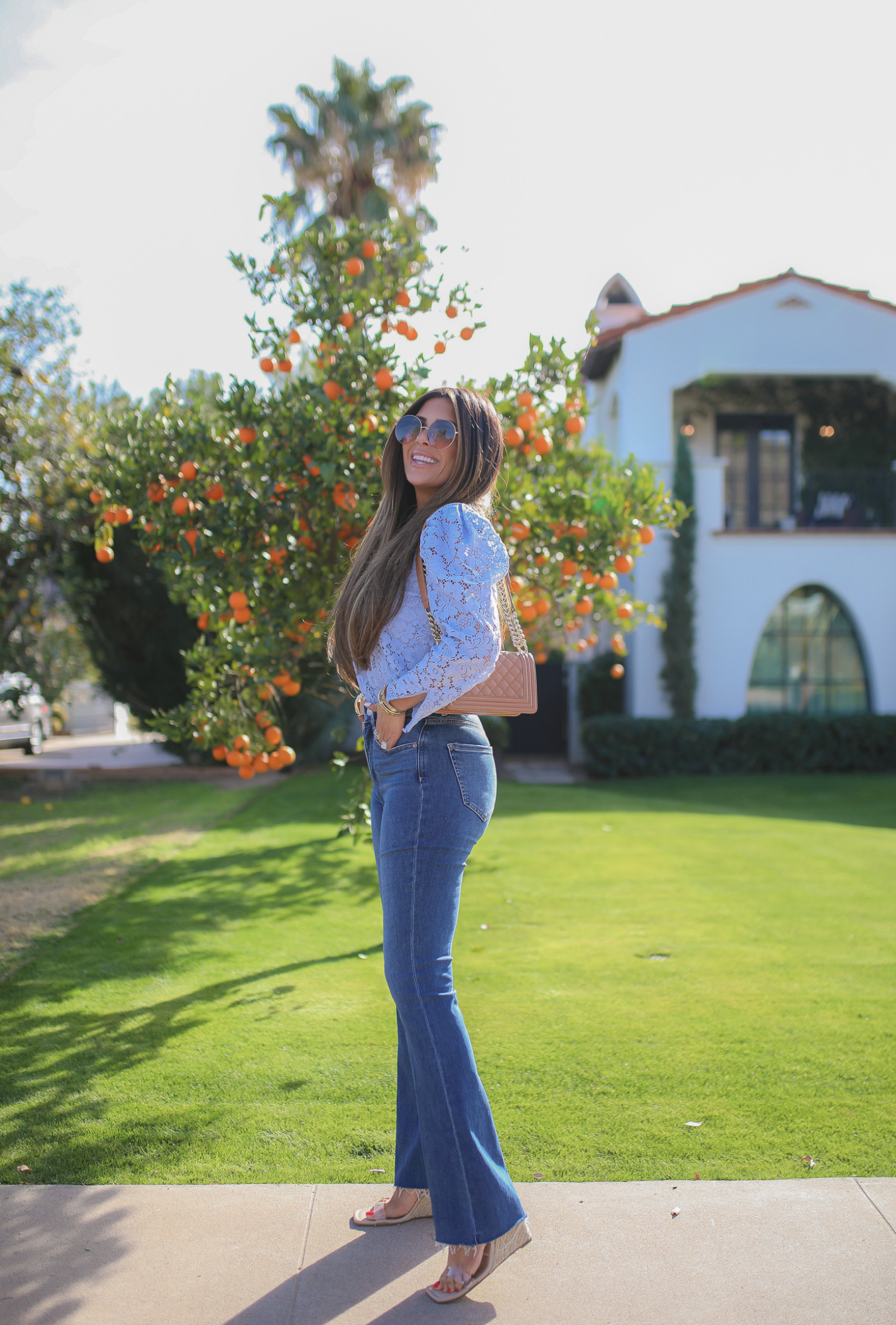 Express Flared Jeans styled for Spring by top US fashion blogger, Emily Gemma of The Sweetest Thing.